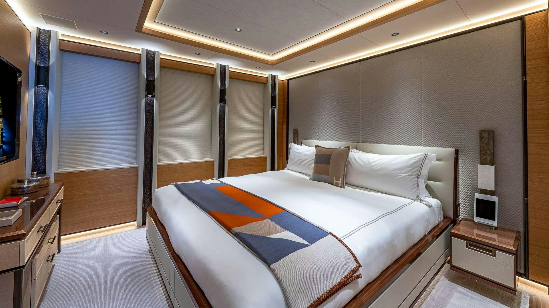 a bed in a room aboard TOP FIVE II Yacht for Charter