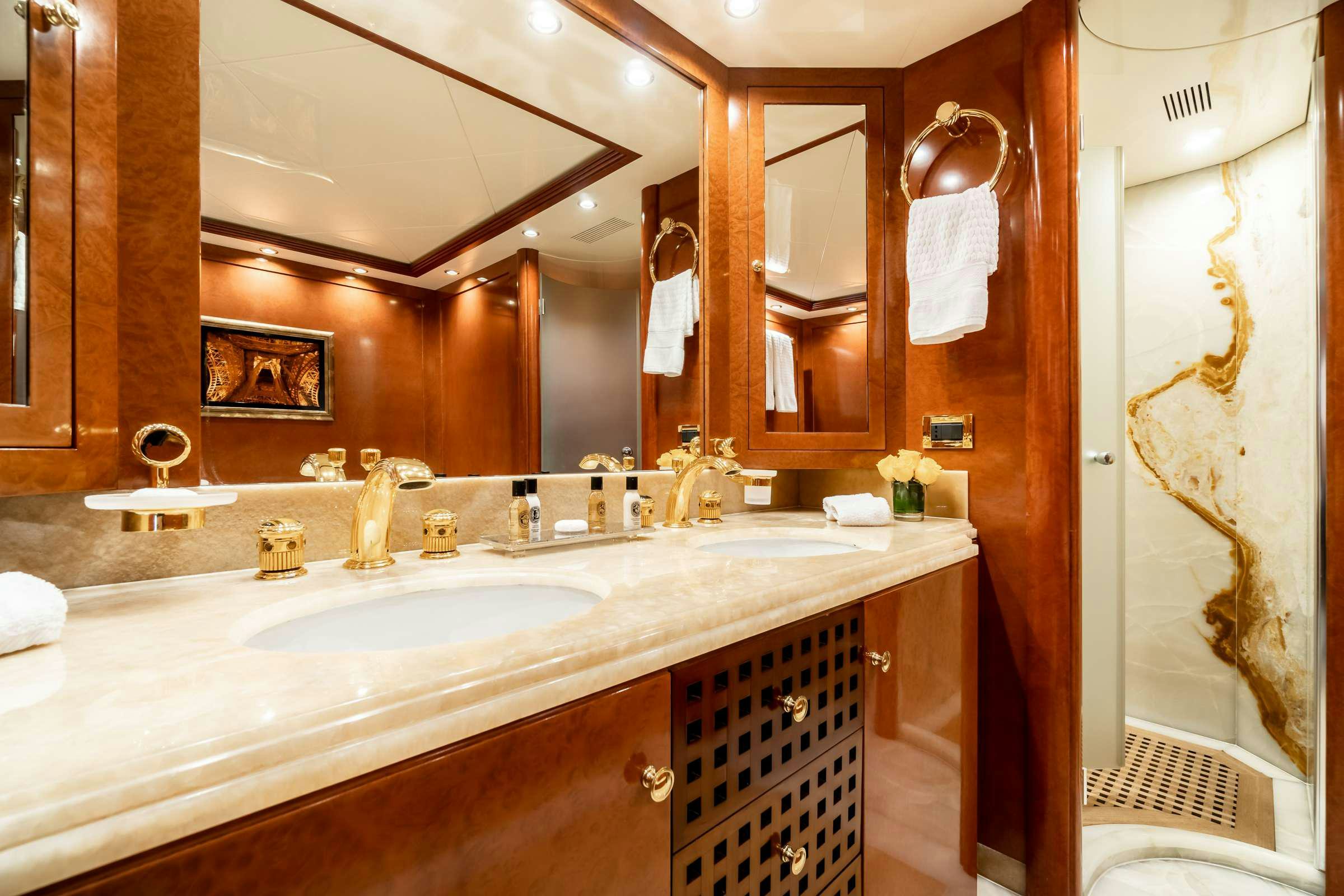 a bathroom with a large mirror aboard OCEANOS Yacht for Charter