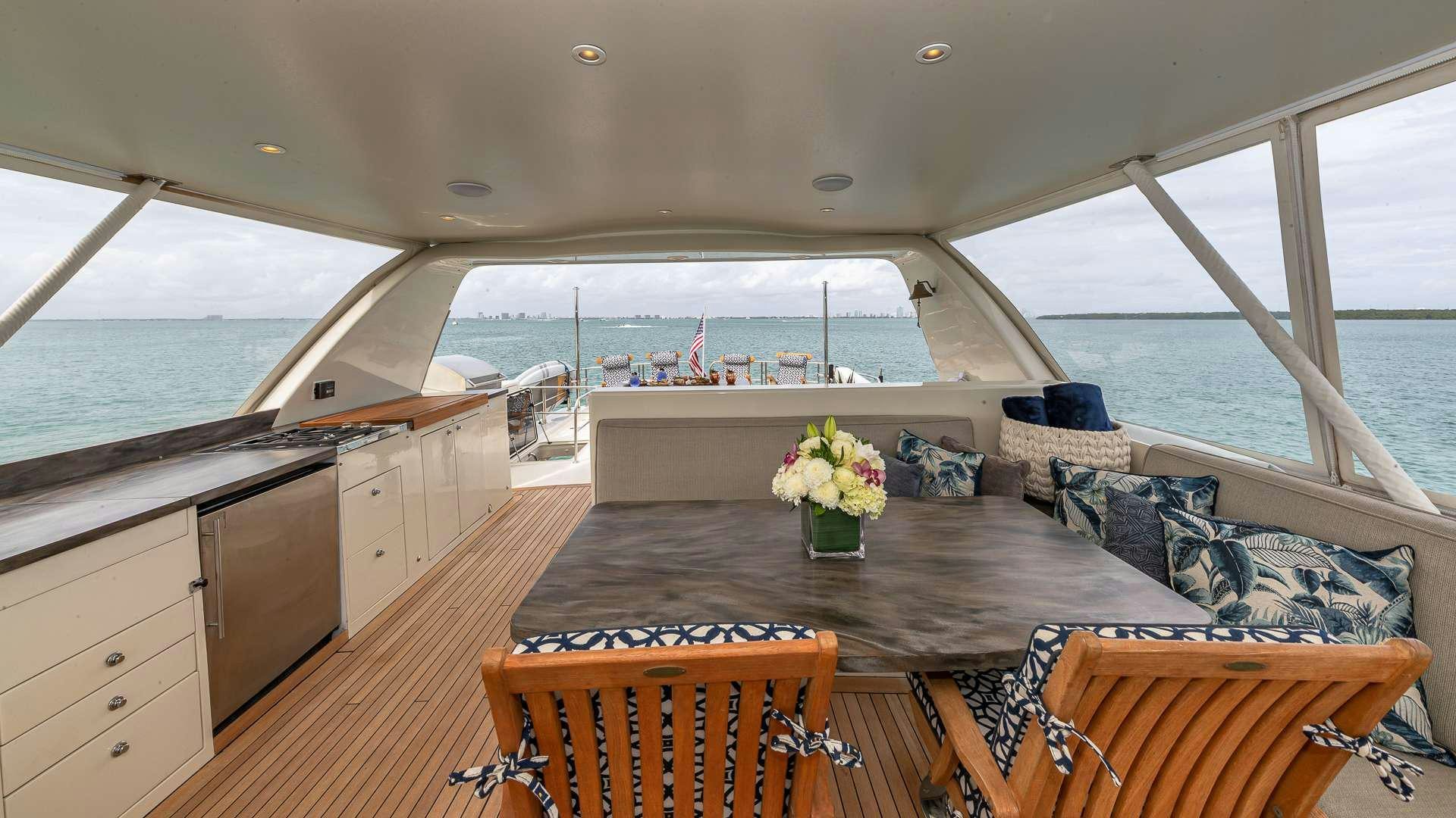 a large living room with a large ocean view aboard SAFARI Yacht for Charter
