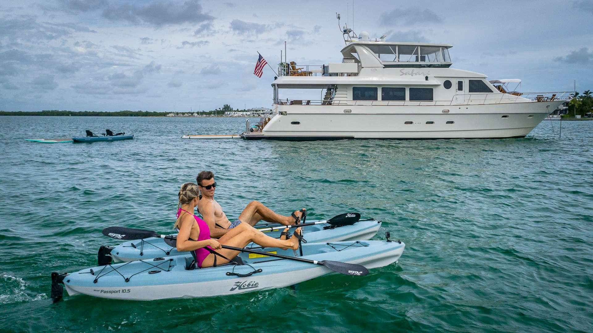 a man and woman on a boat in the water aboard SAFARI Yacht for Charter