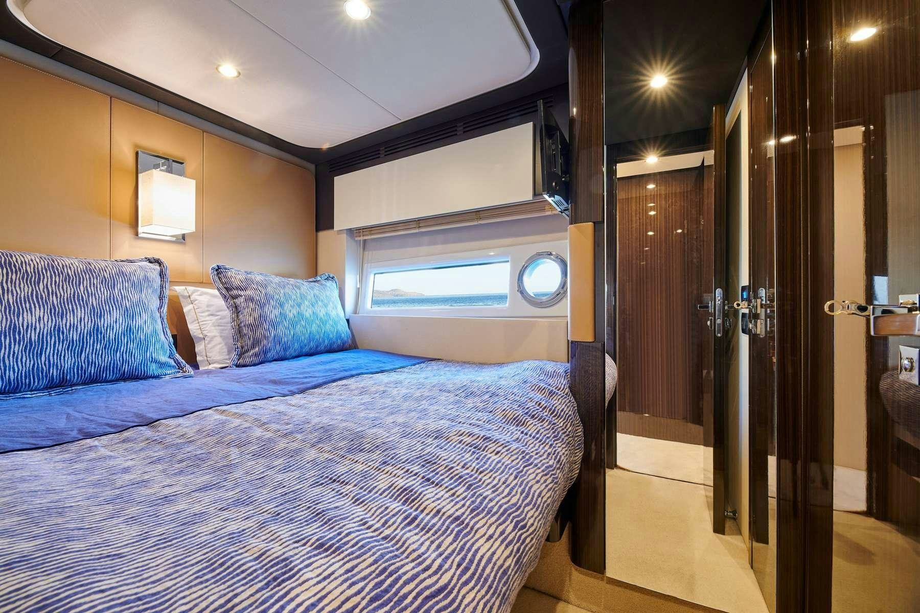 a bed in a hotel room aboard ALKYONE Yacht for Charter