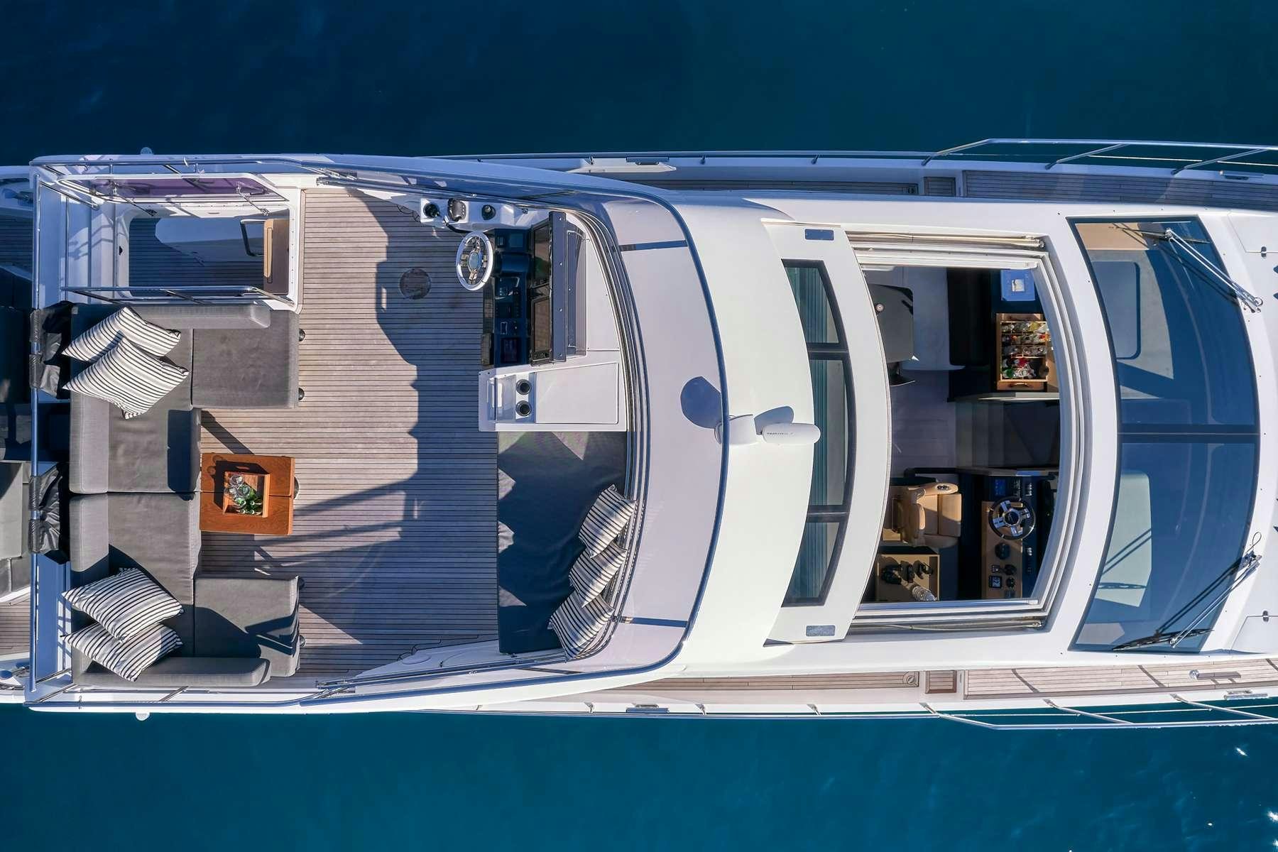a blue train with a window aboard ALKYONE Yacht for Charter