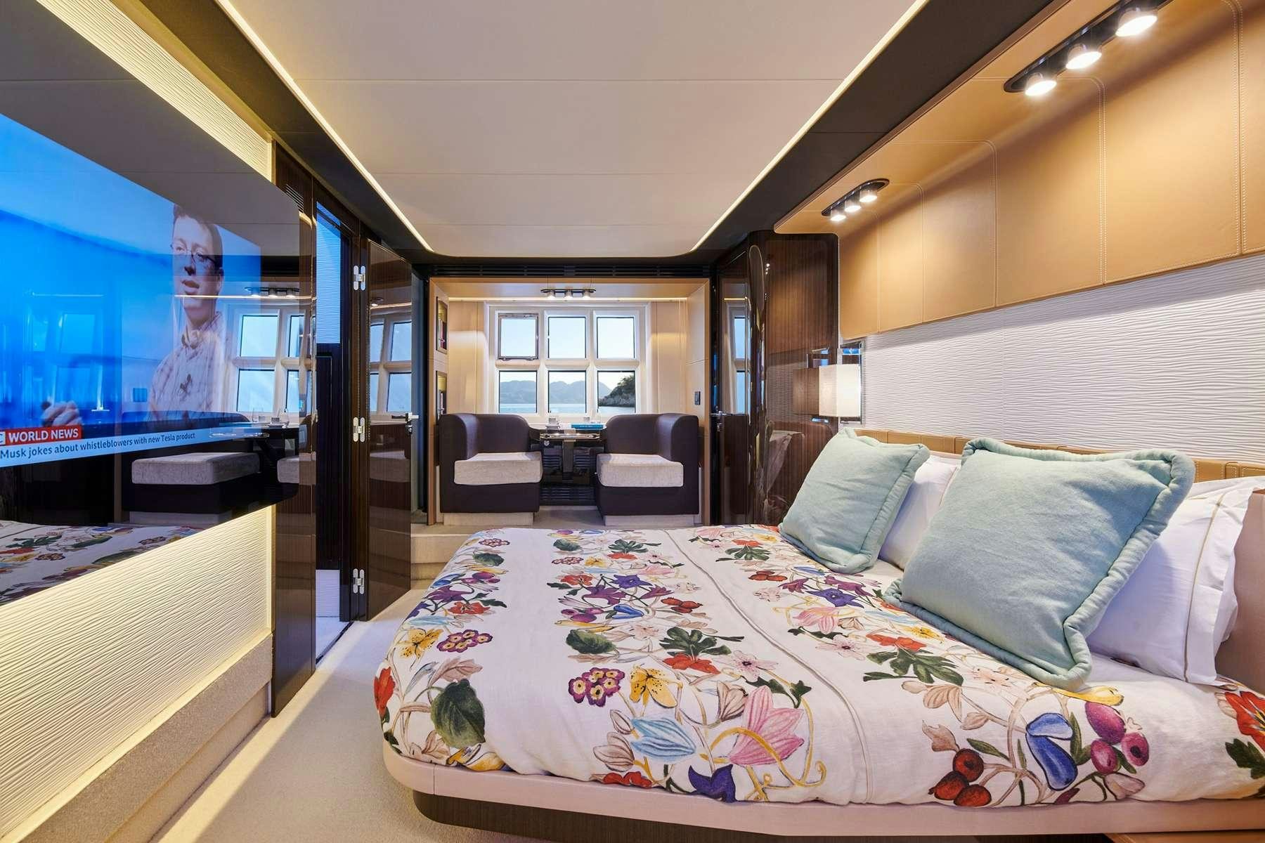 a bed in a room aboard ALKYONE Yacht for Charter