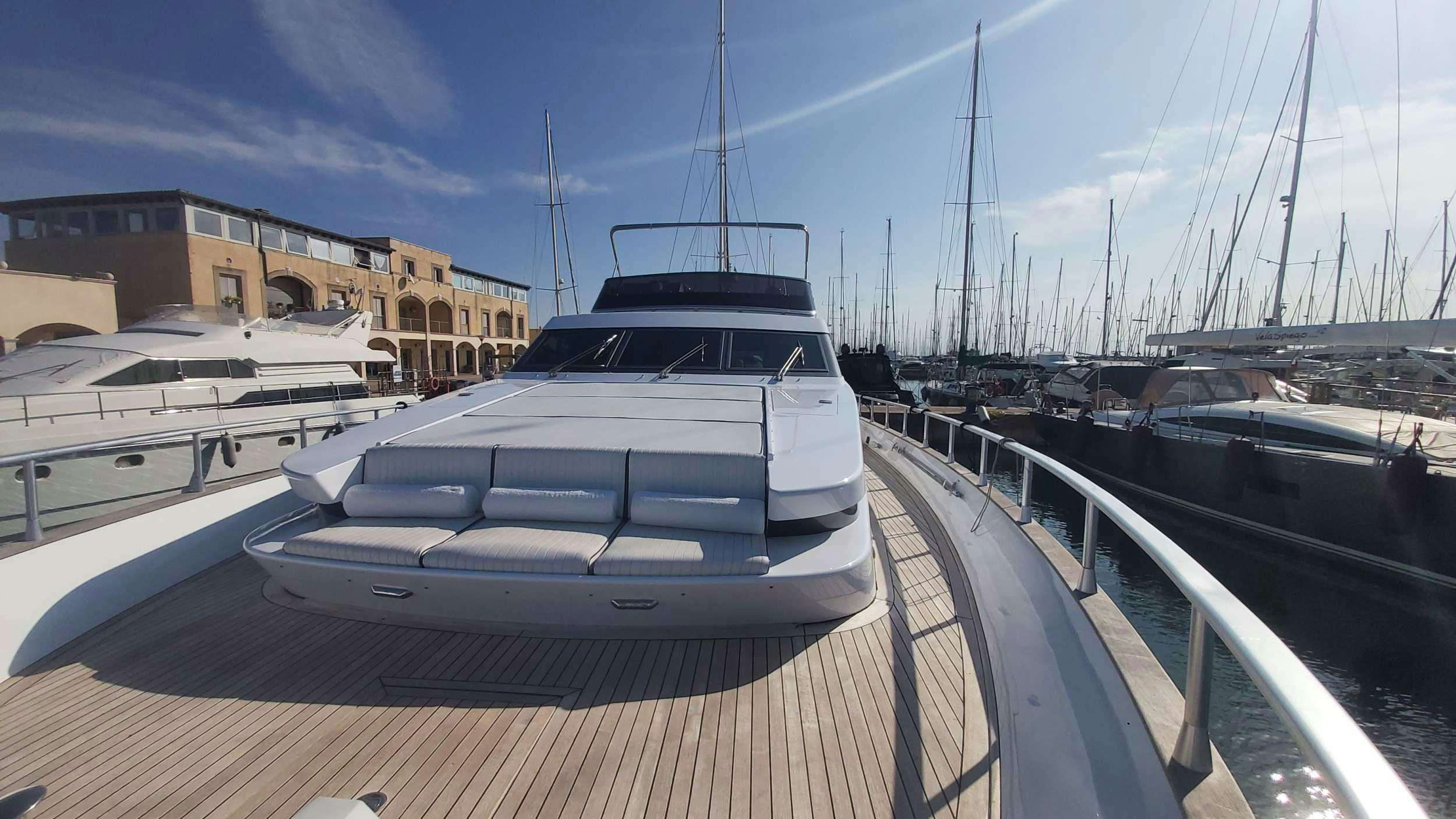 a boat parked on a dock aboard San Matteo Yacht for Charter