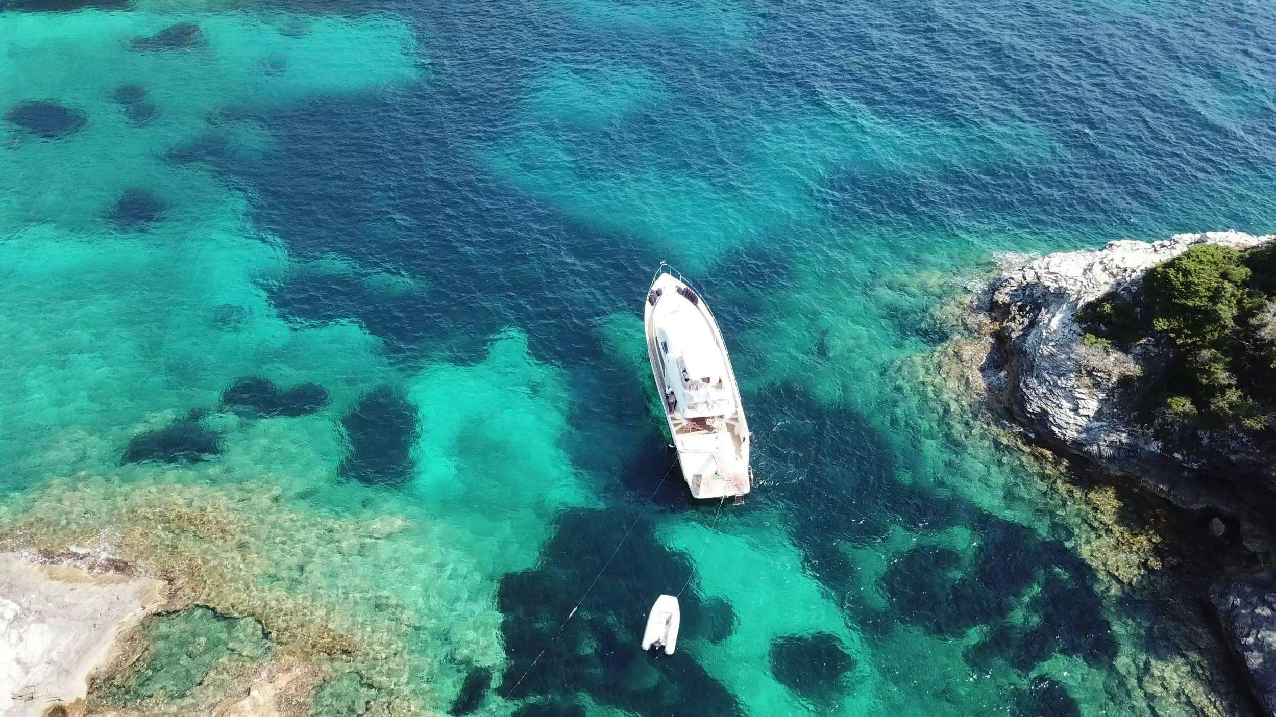 a boat sailing in the sea aboard Boomerang II Yacht for Charter