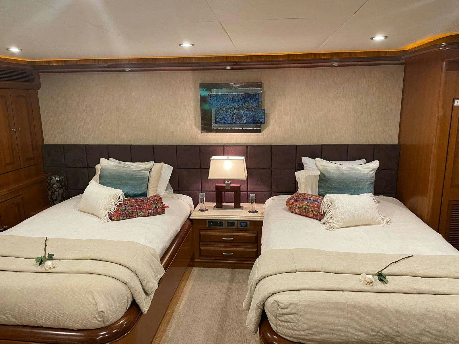 a room with two beds aboard SCOTT FREE Yacht for Charter