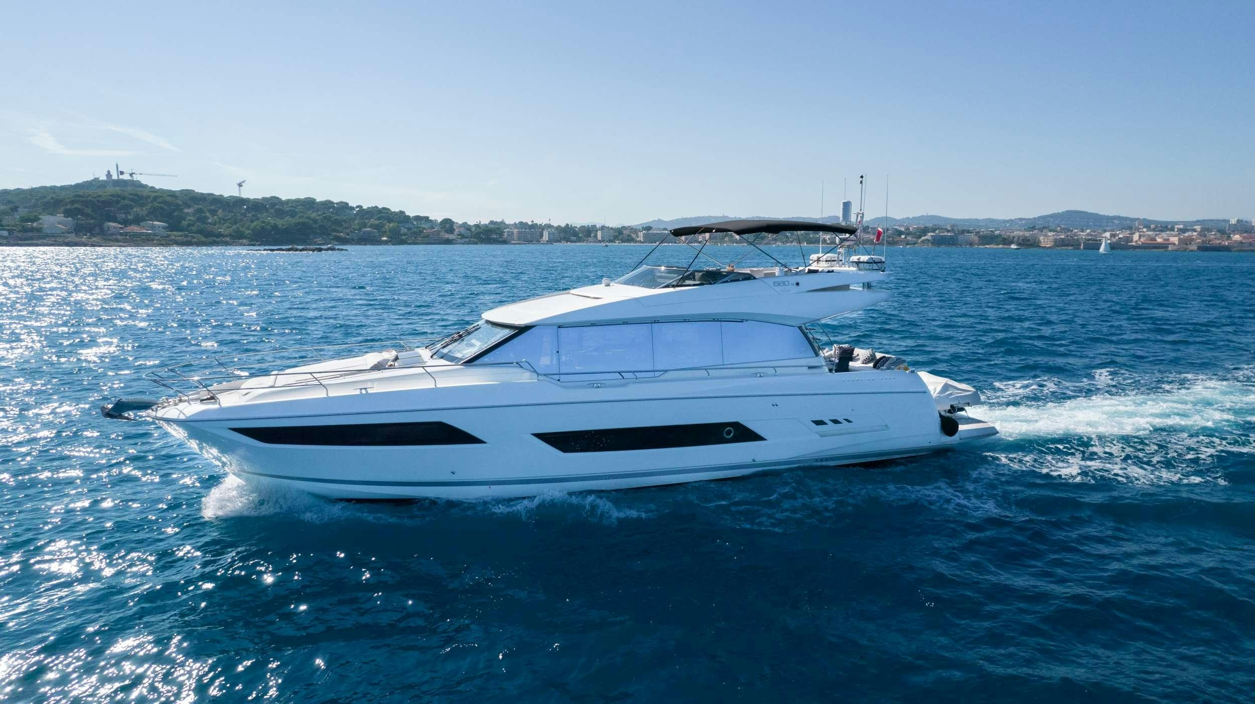a white yacht on the water aboard APOLLONIA Yacht for Charter