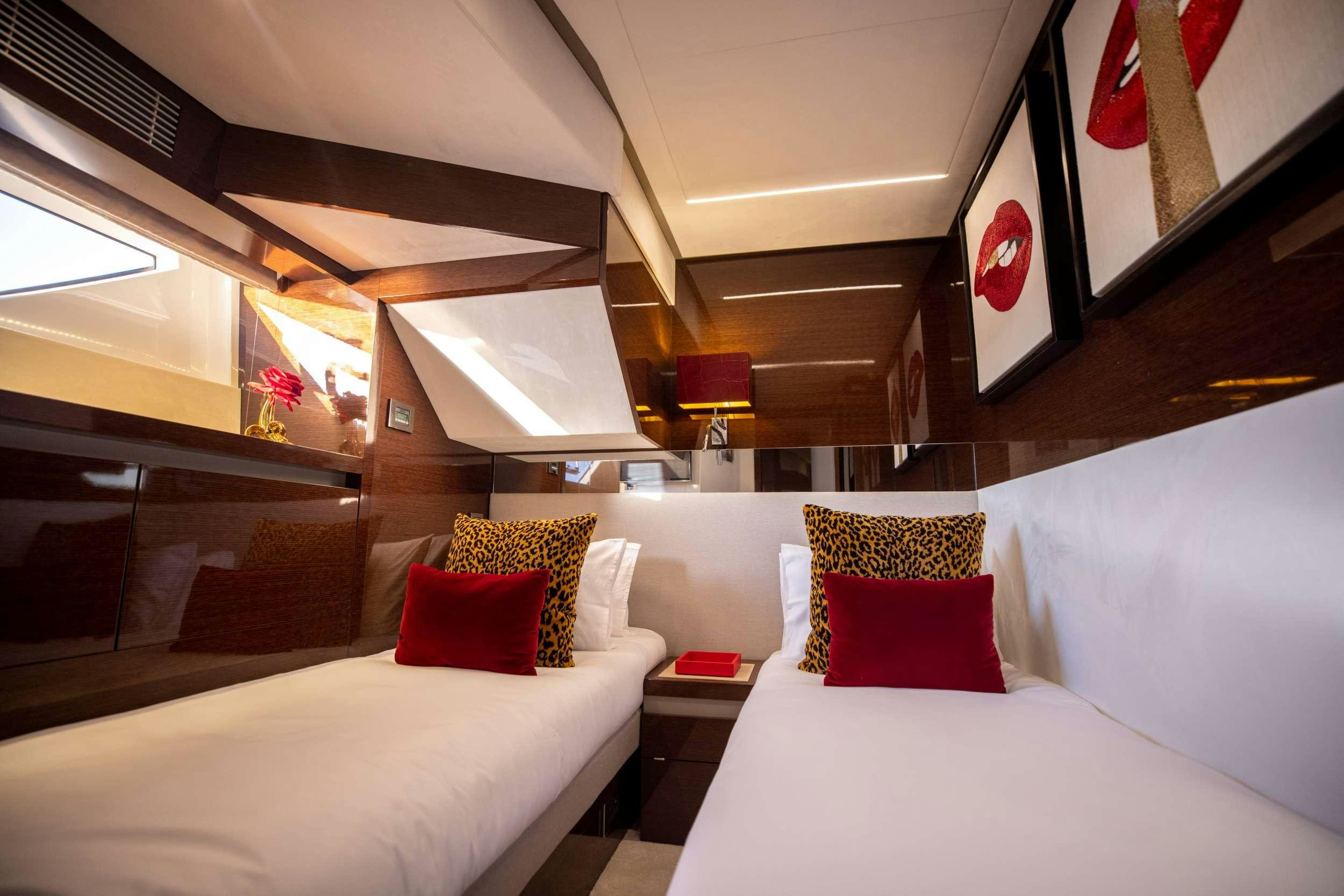 a room with two beds aboard APOLLONIA Yacht for Charter
