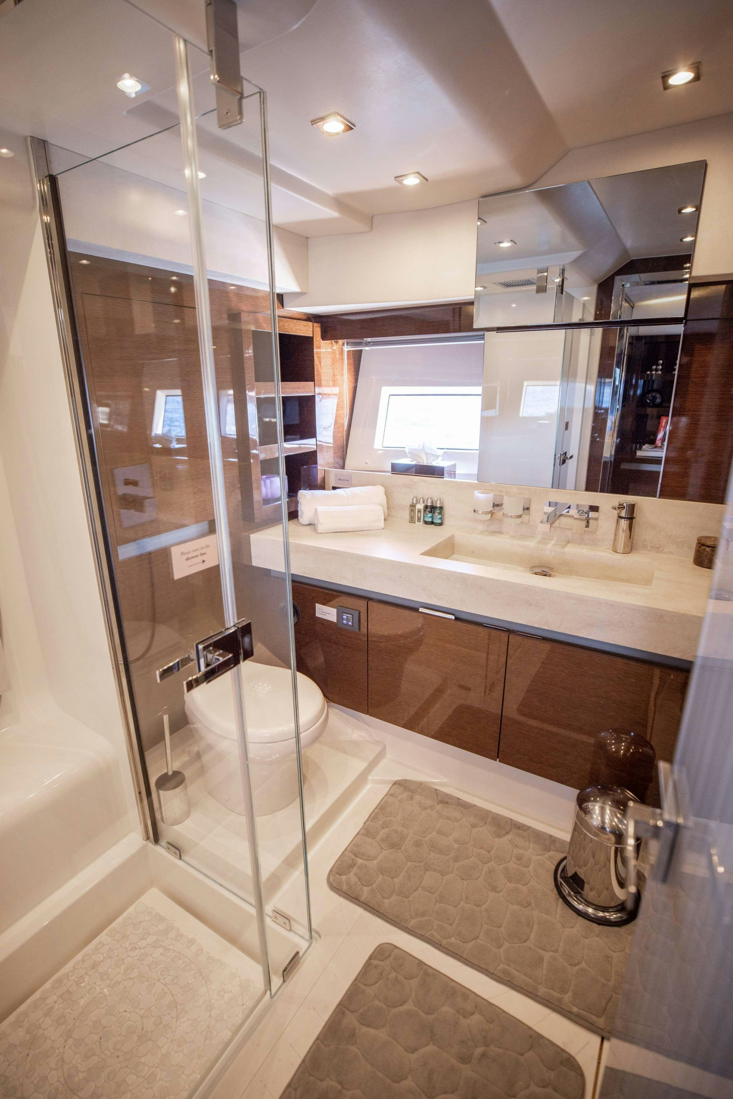 a bathroom with a glass shower aboard APOLLONIA Yacht for Charter