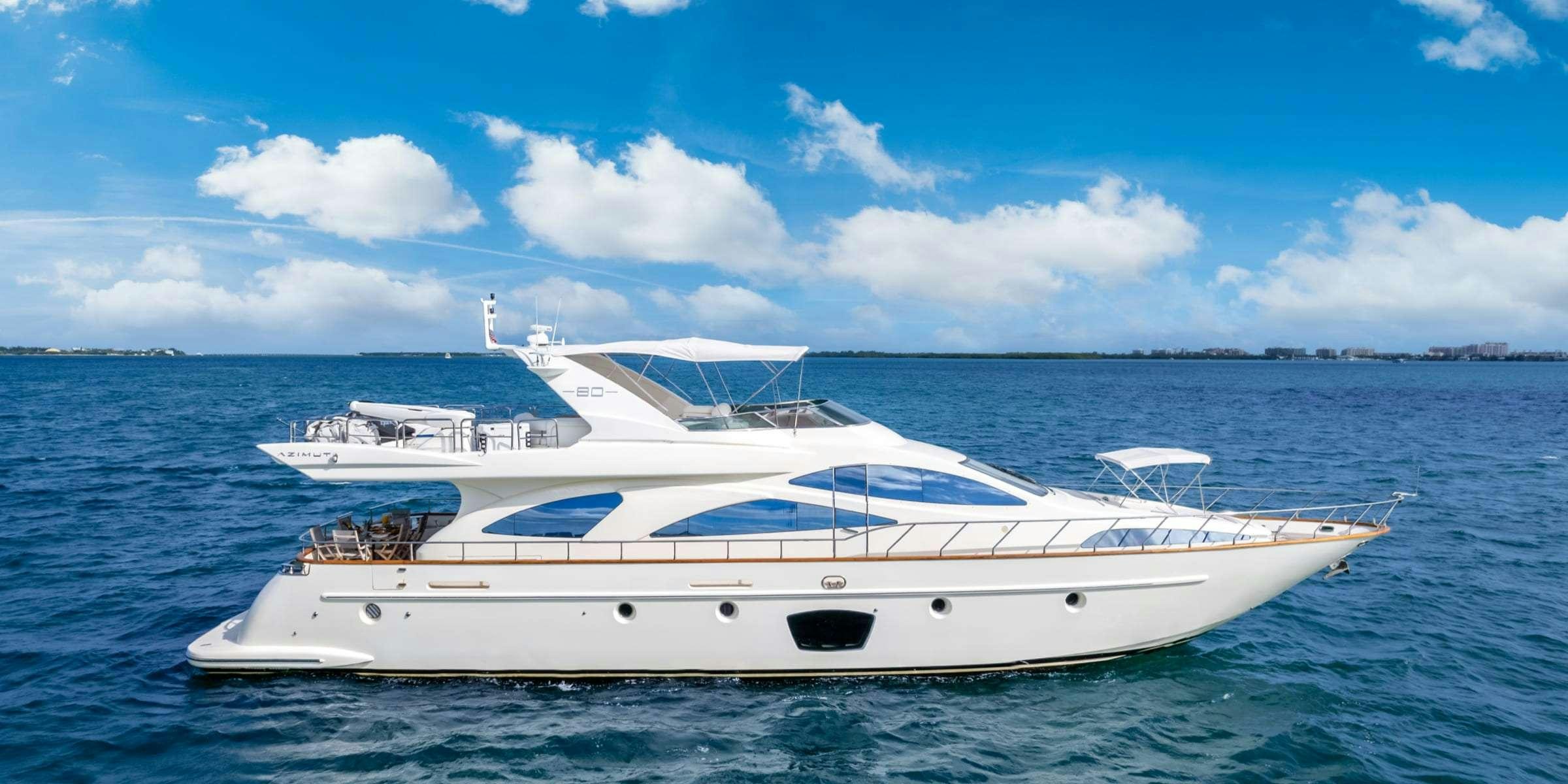 a white yacht in the water aboard TRUCO II Yacht for Charter