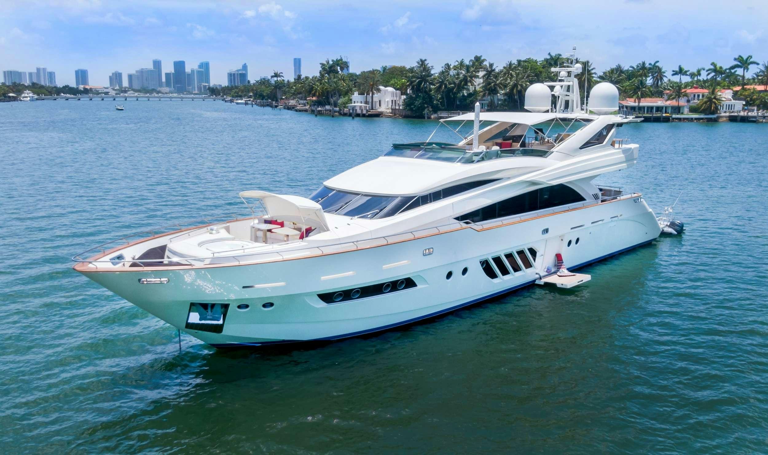 a white boat on the water aboard CASUAL Yacht for Charter