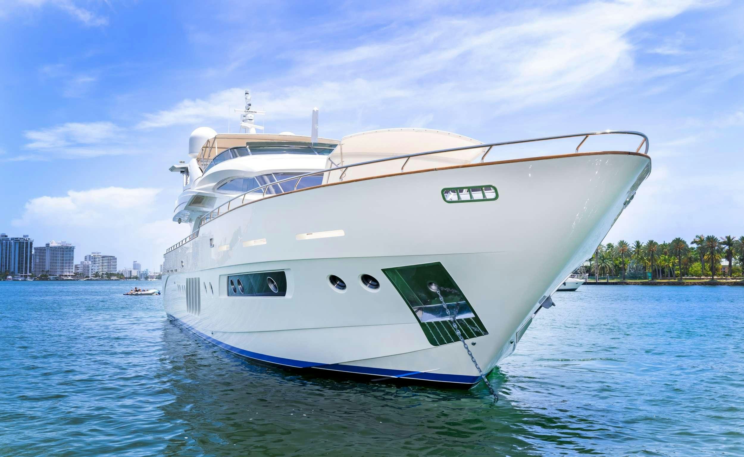a white boat on the water aboard CASUAL Yacht for Charter