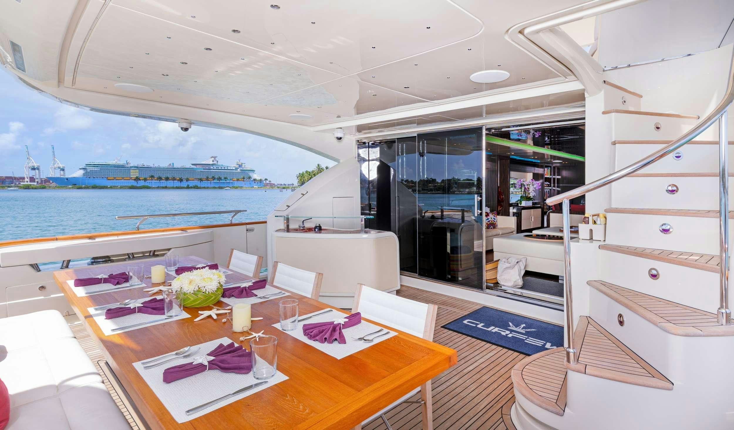 a room with a table and chairs aboard CASUAL Yacht for Charter