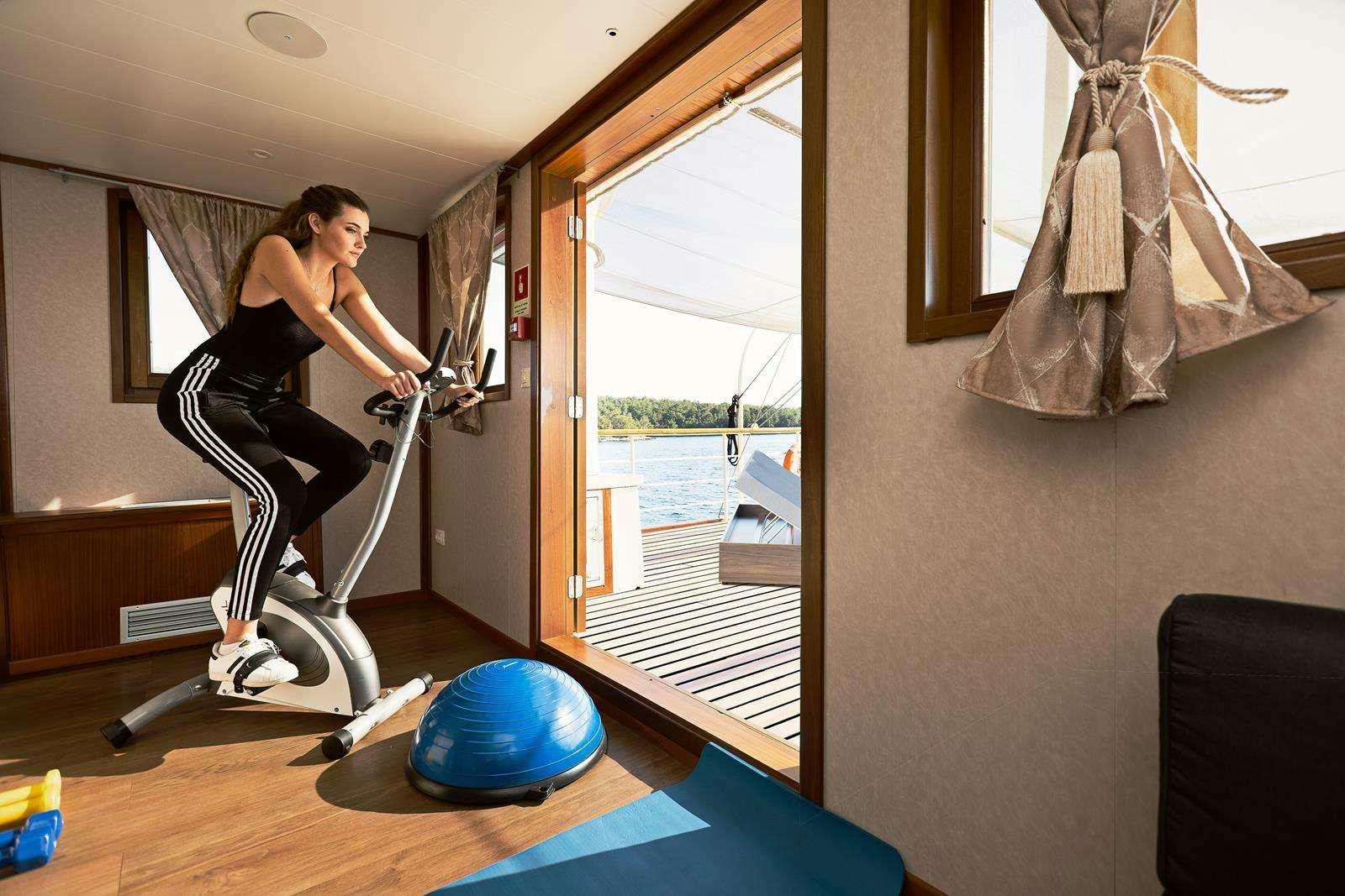 a person playing a game aboard GALLANT Yacht for Charter