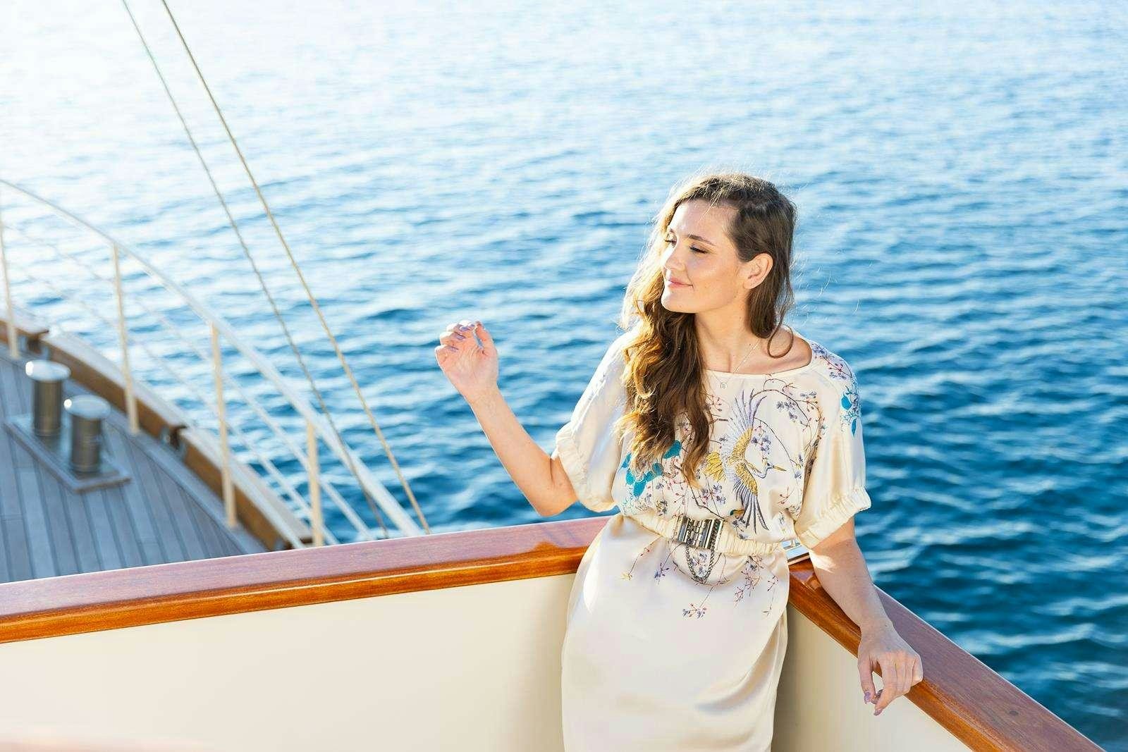 a person on a boat aboard GALLANT Yacht for Charter