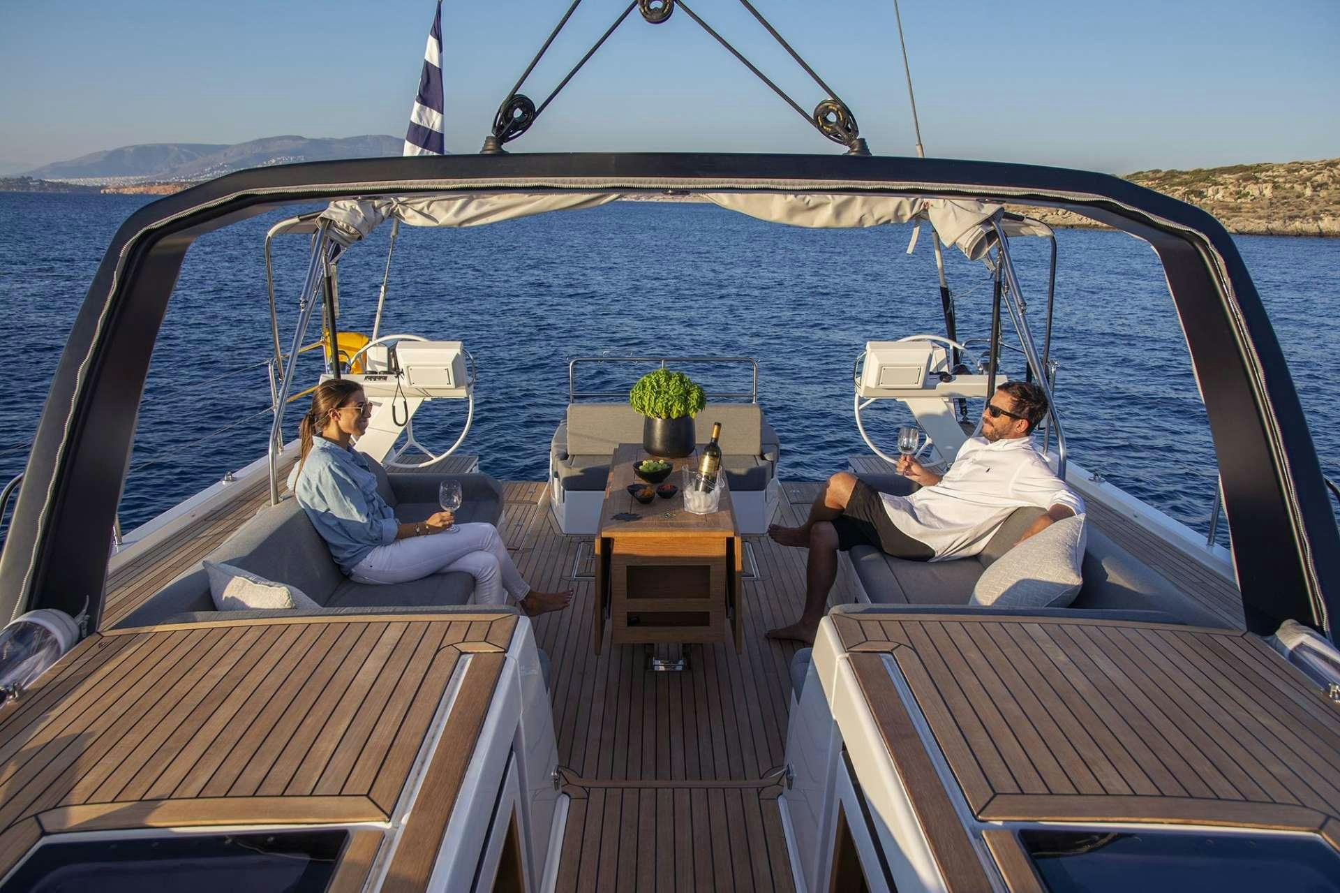 a couple of people on a boat aboard SOPHIA Yacht for Charter