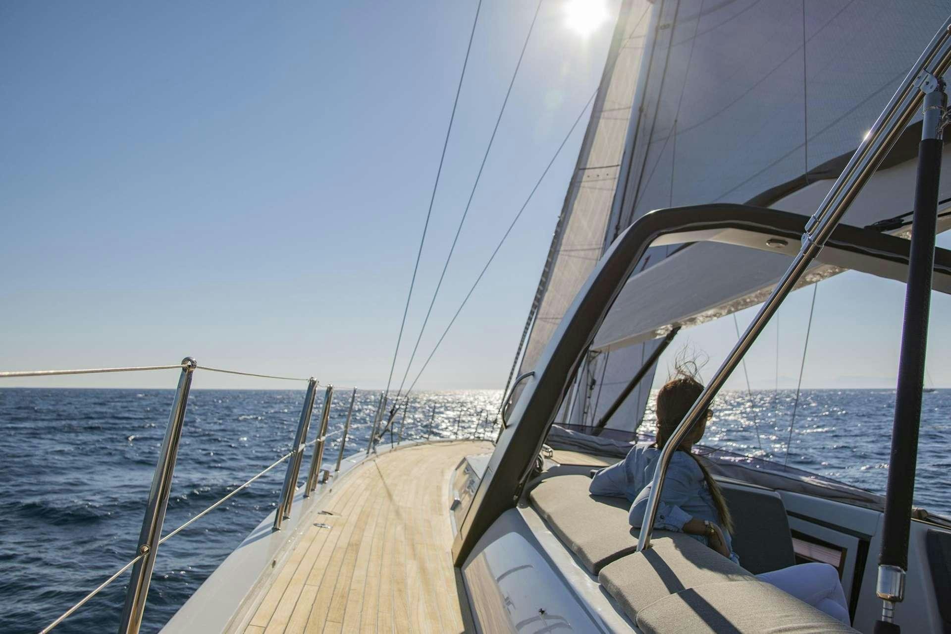 a person sitting on a boat aboard SOPHIA Yacht for Charter