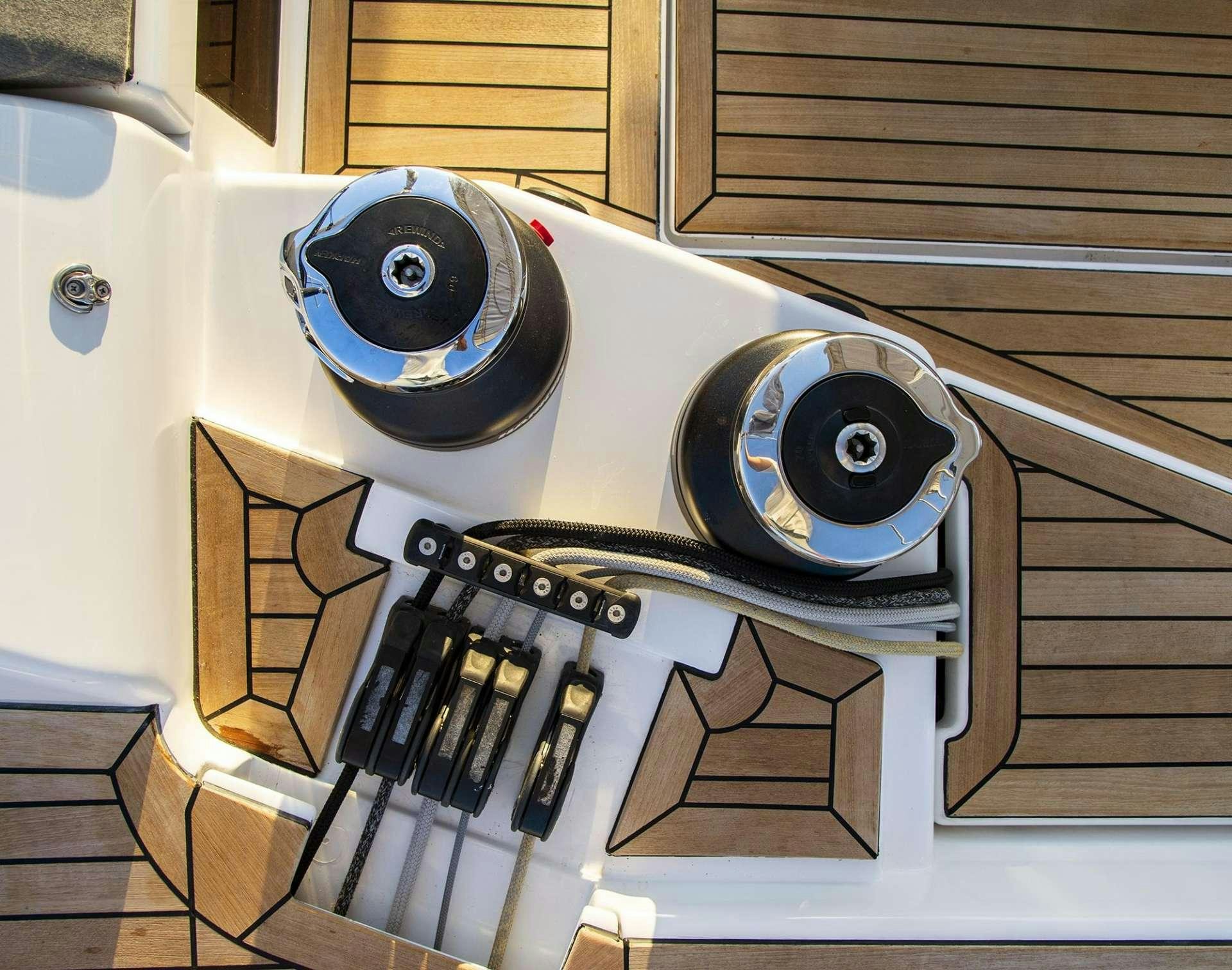 a white and black camera aboard SOPHIA Yacht for Charter