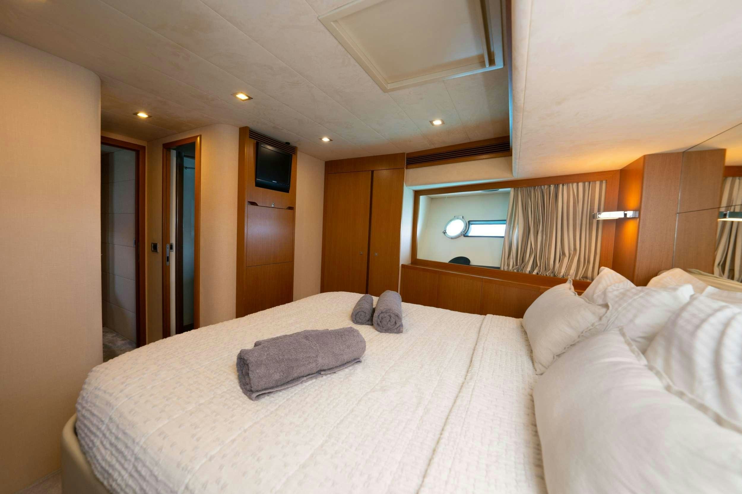 a bed in a hotel room aboard NINETEEN Yacht for Charter