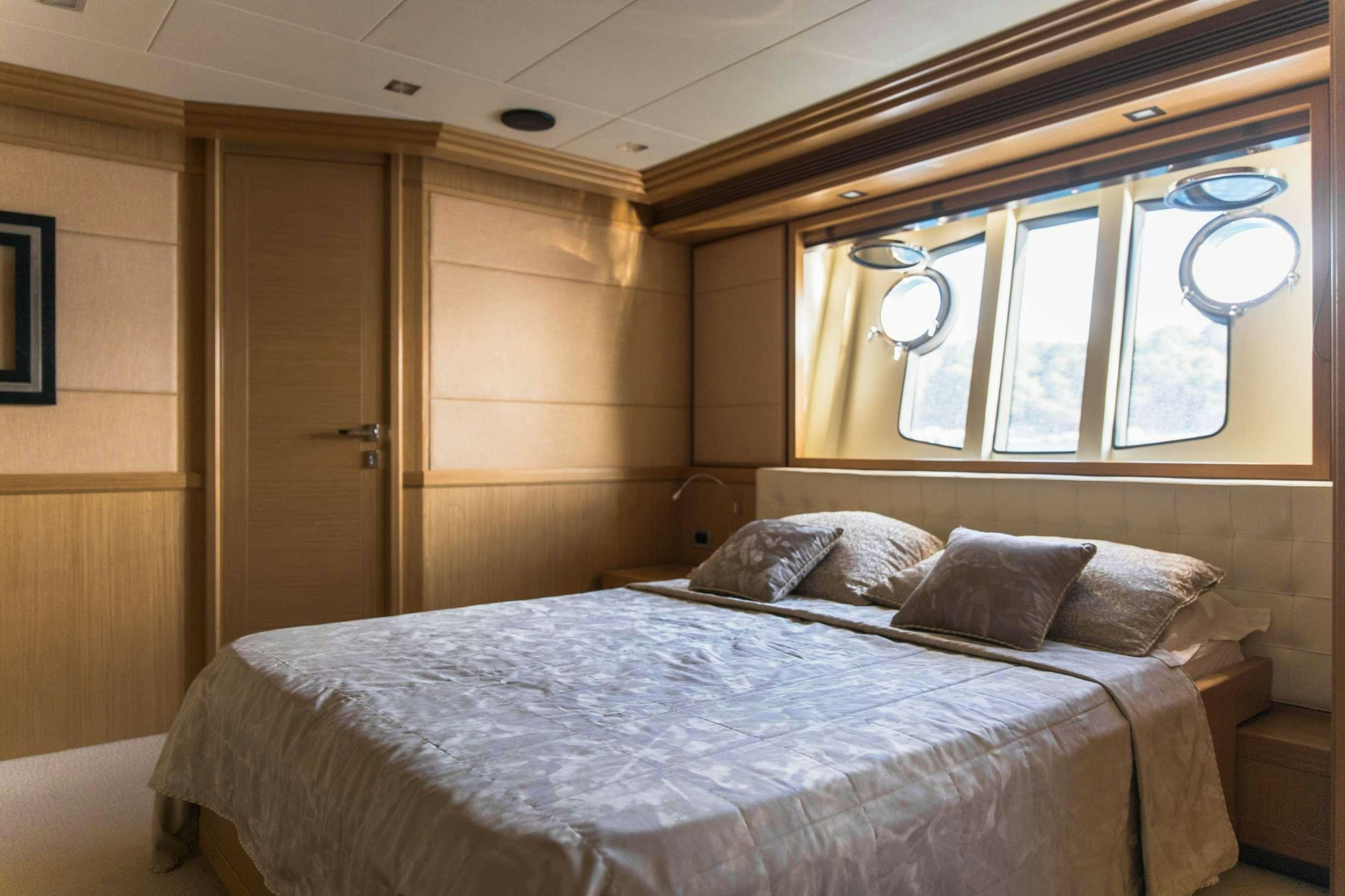 a bed in a room aboard FRIEND'S BOAT Yacht for Charter