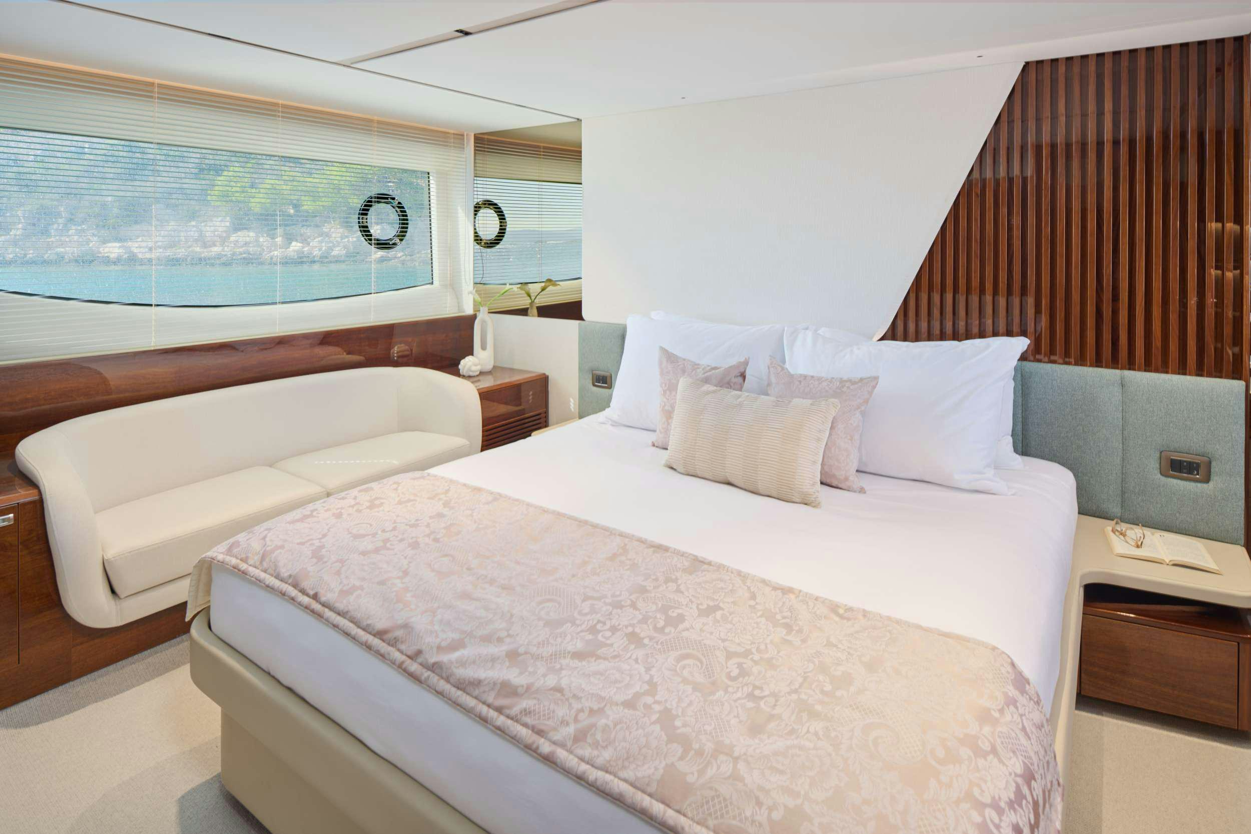 a couple of beds in a hotel room aboard ELIZABETH Yacht for Charter