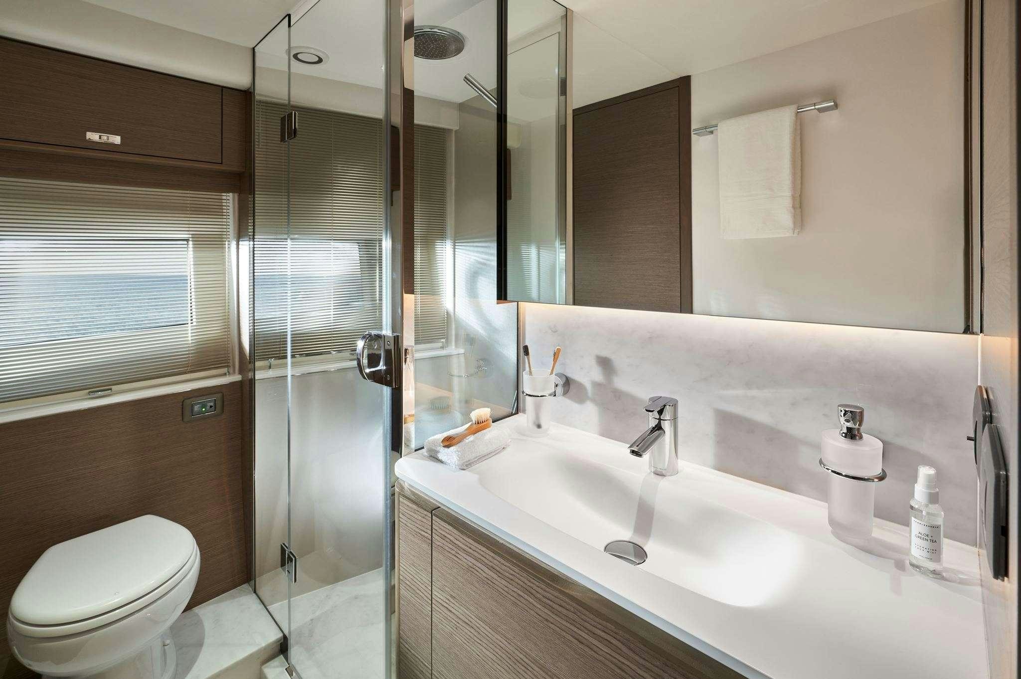 a bathroom with a glass shower aboard ELIZABETH Yacht for Charter