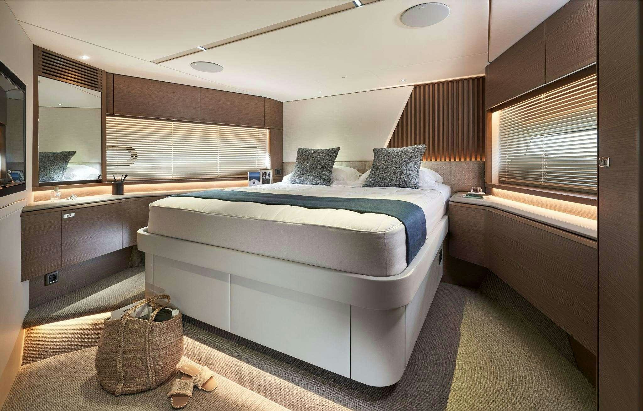 a bed in a room aboard ELIZABETH Yacht for Charter