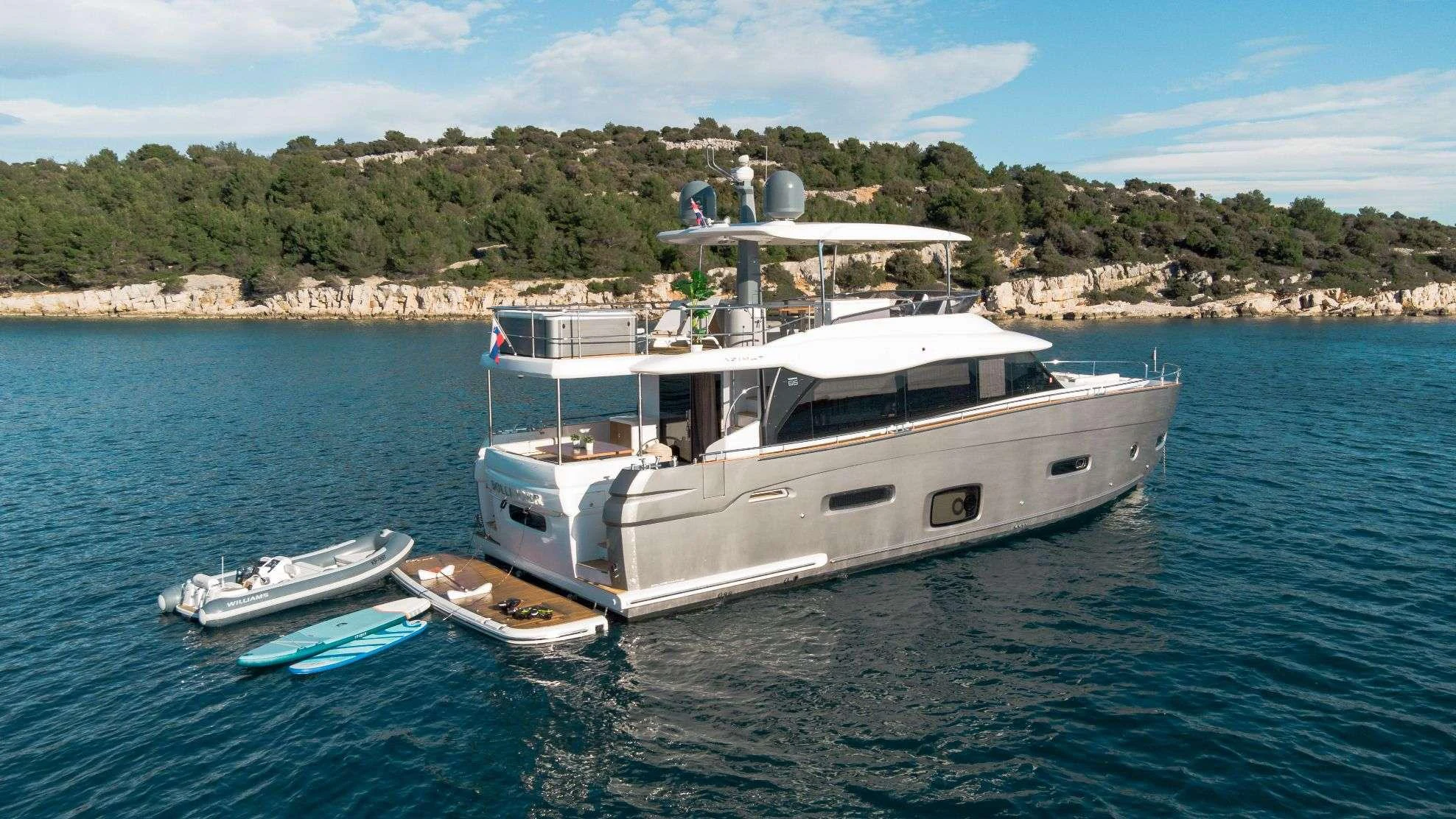 a boat in the water aboard BOLLINGER Yacht for Charter
