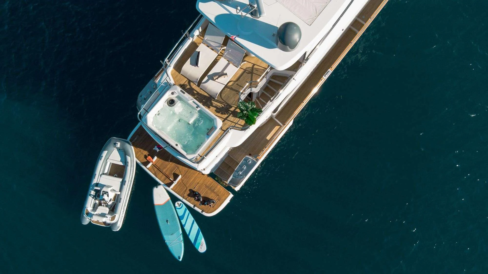 a satellite over a body of water aboard BOLLINGER Yacht for Charter