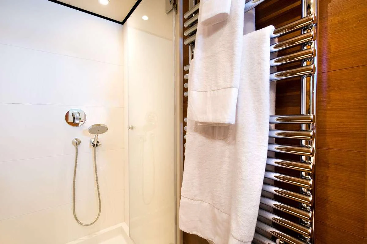 a towel on a rack aboard LOANA Yacht for Charter