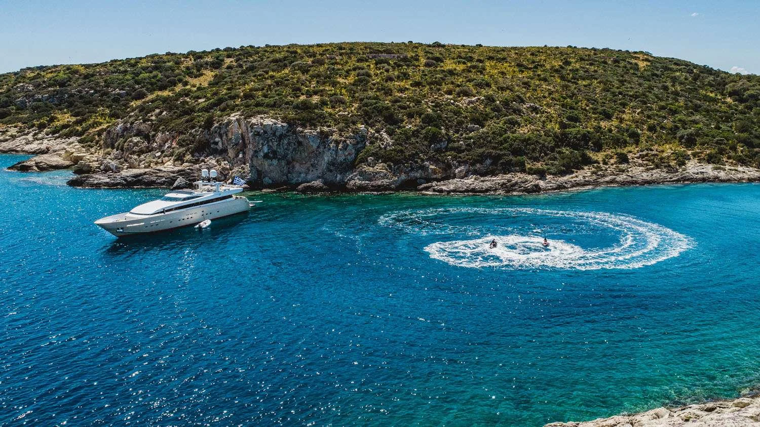 a boat in the water aboard LOANA Yacht for Charter