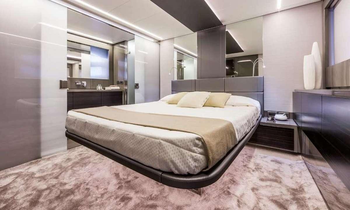 a bed in a room aboard VELOCITY Yacht for Charter