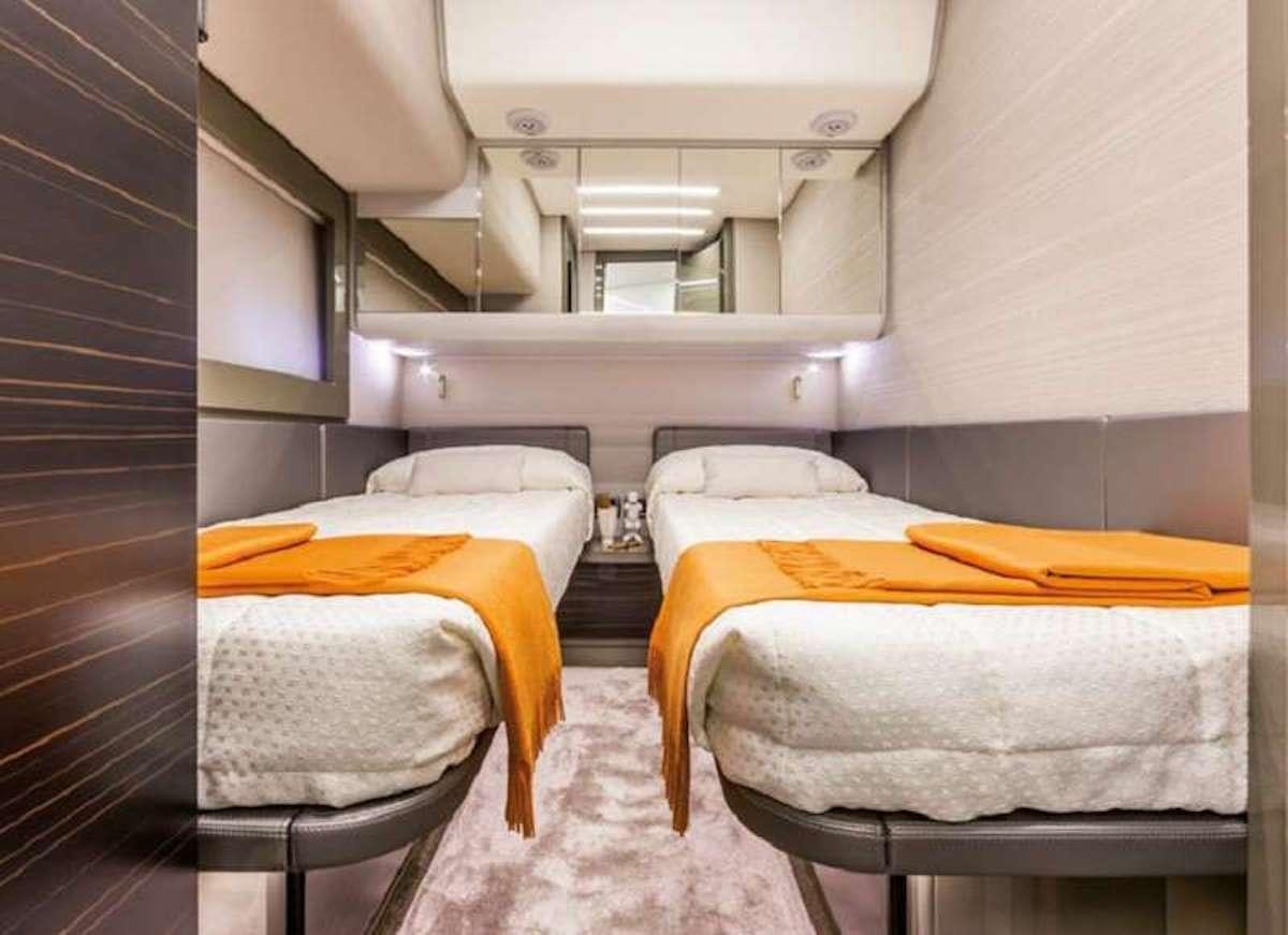 a room with bunk beds aboard VELOCITY Yacht for Charter