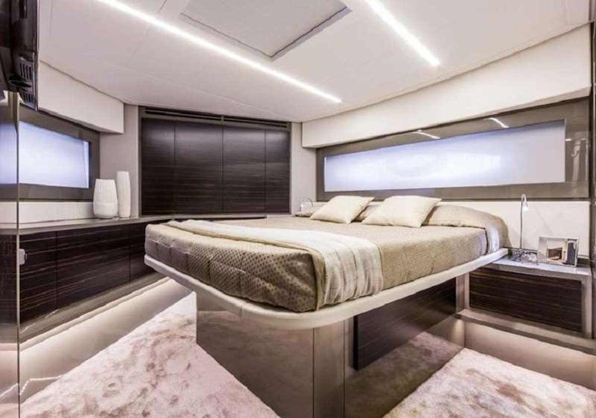 a large bed in a room aboard VELOCITY Yacht for Charter