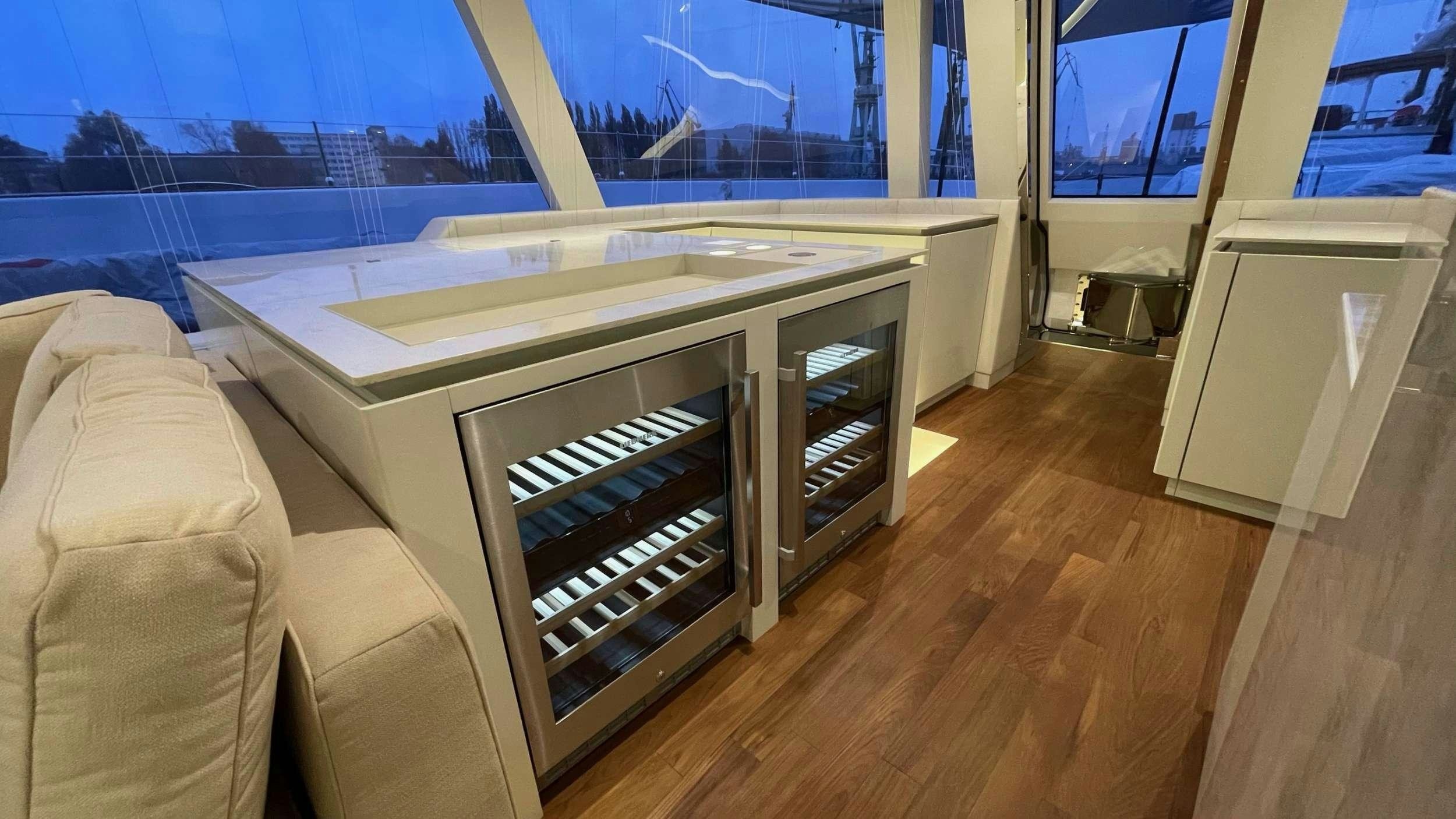 a large room with a large window aboard SEACLUSION Yacht for Charter