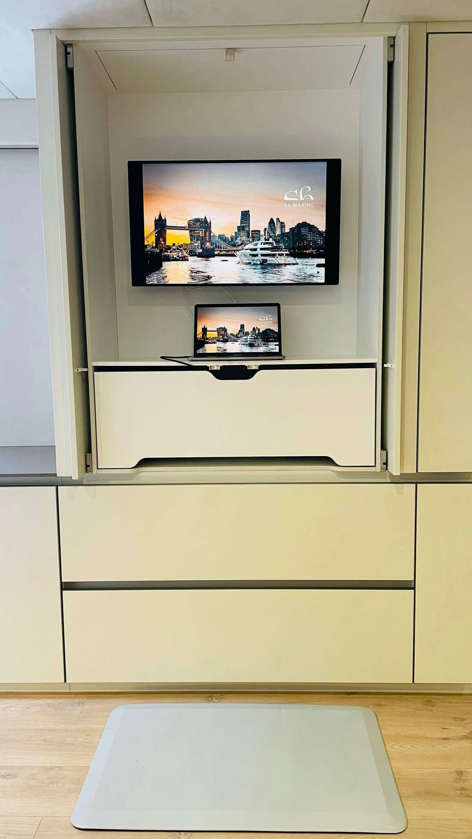 a white rectangular object with a picture on it aboard SEACLUSION Yacht for Charter