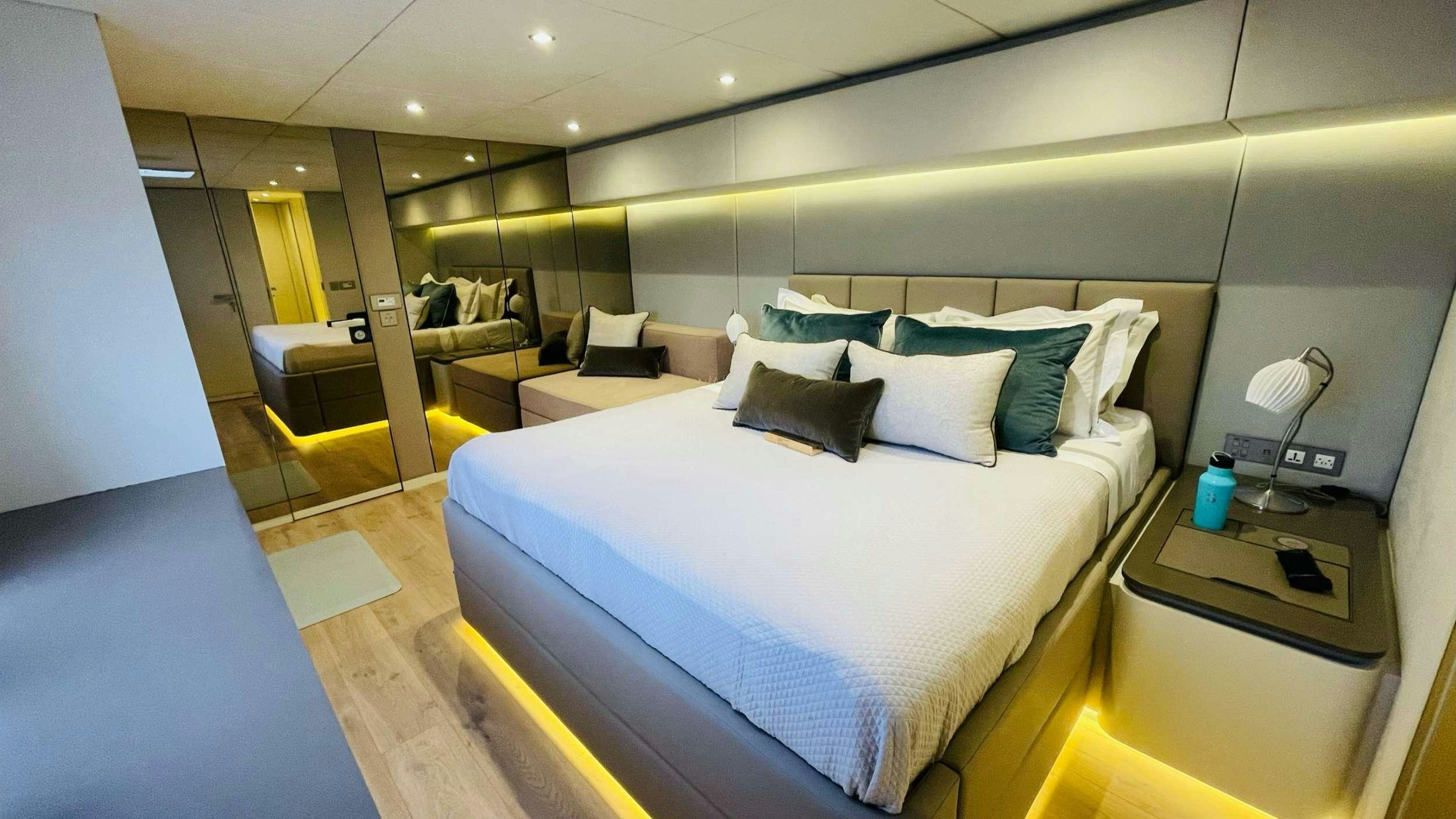 a bed in a room aboard SEACLUSION Yacht for Charter