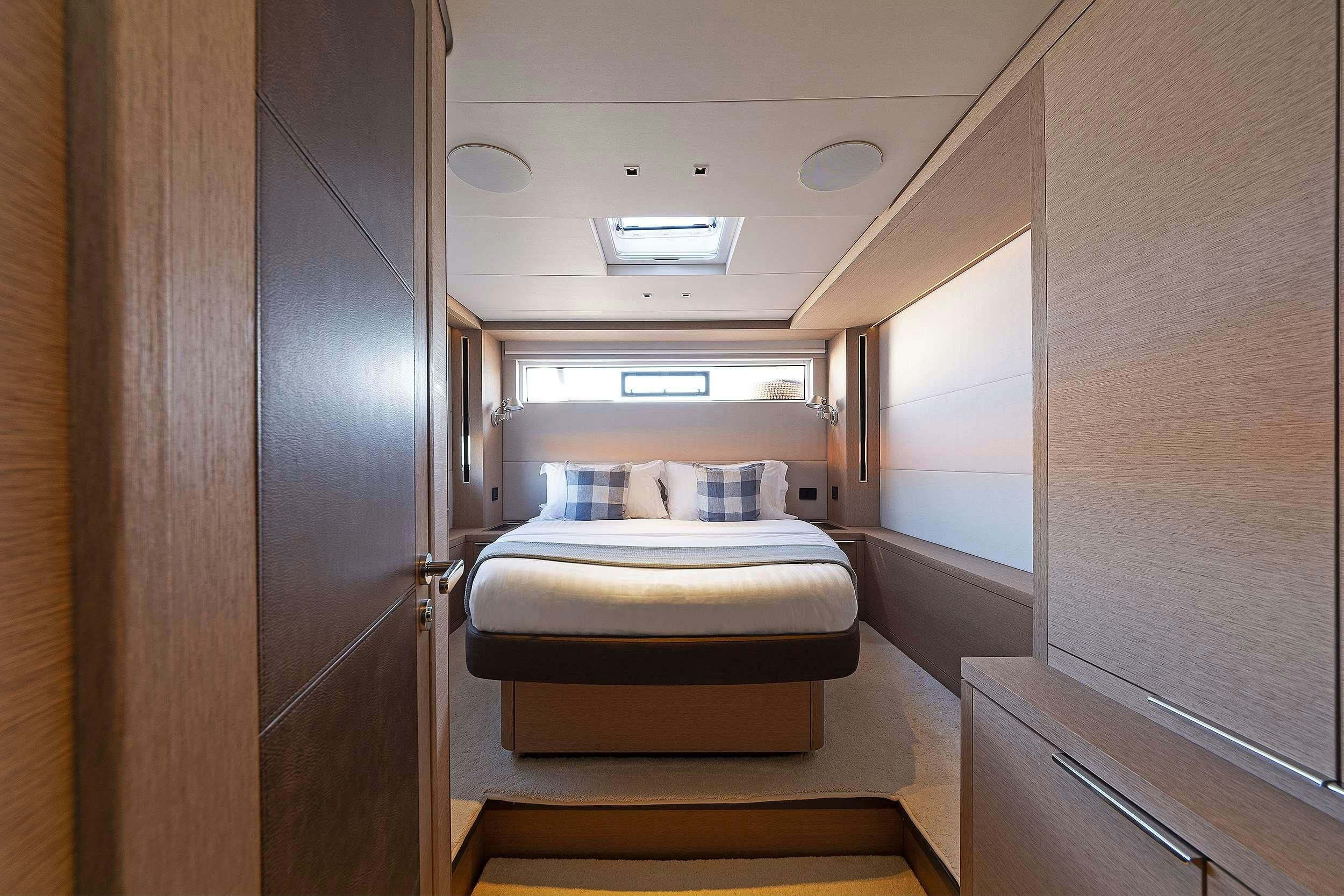 a bed in a room aboard DAIQUIRI Yacht for Charter