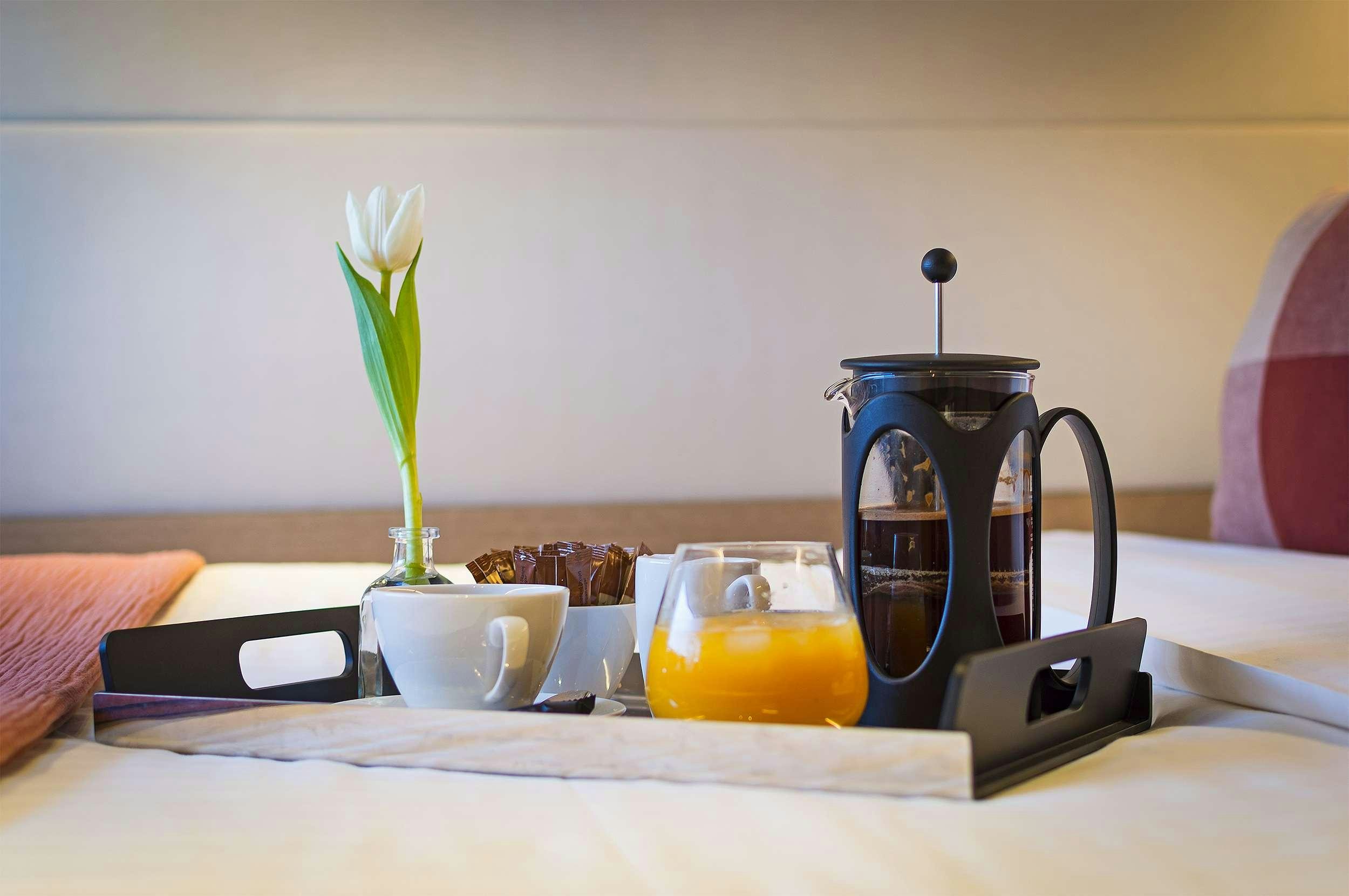 a table with a tea kettle and cups on it aboard DAIQUIRI Yacht for Charter