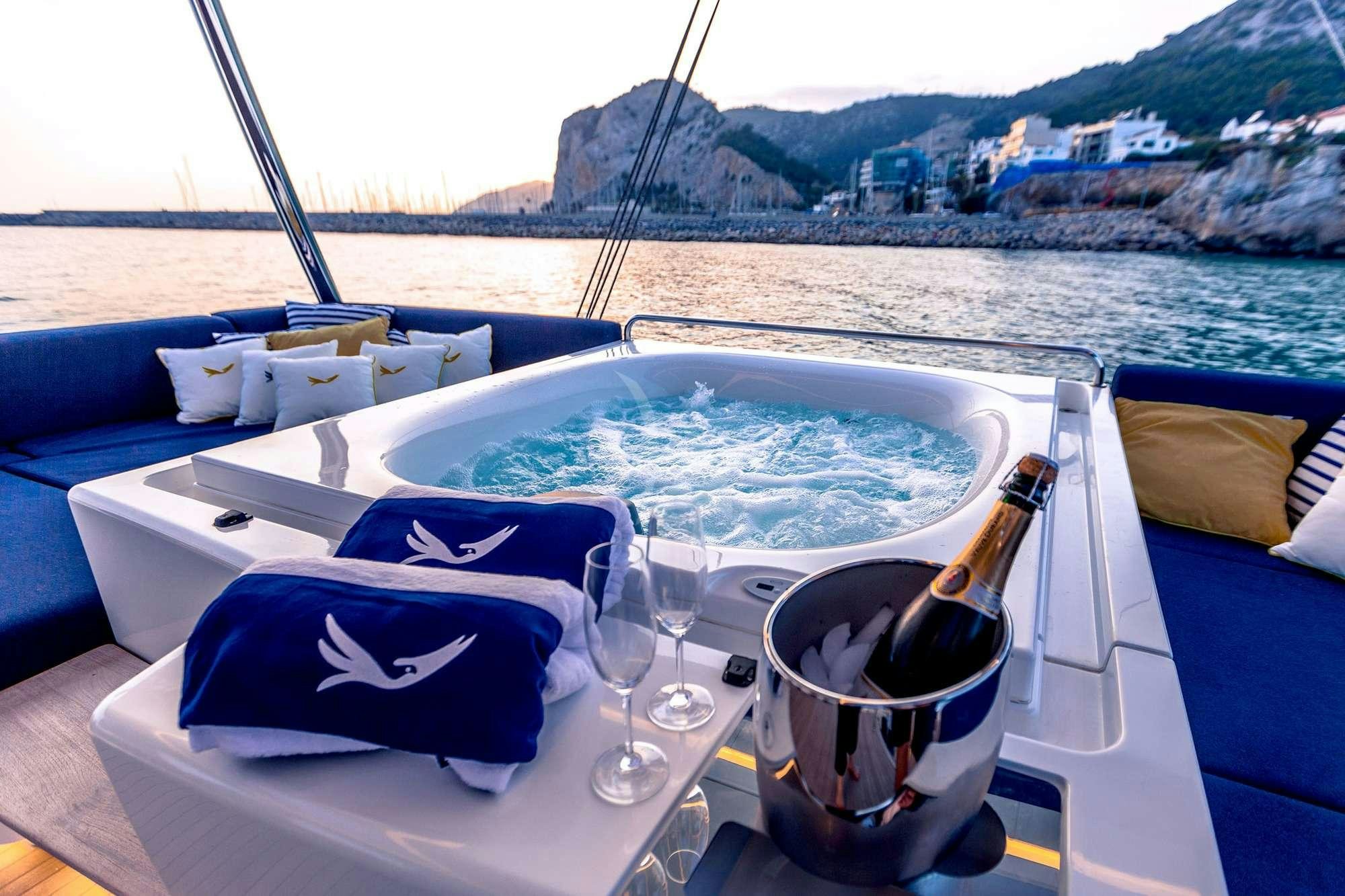 a boat with a hat and a towel on it aboard MARIAH PRINCESS III Yacht for Charter