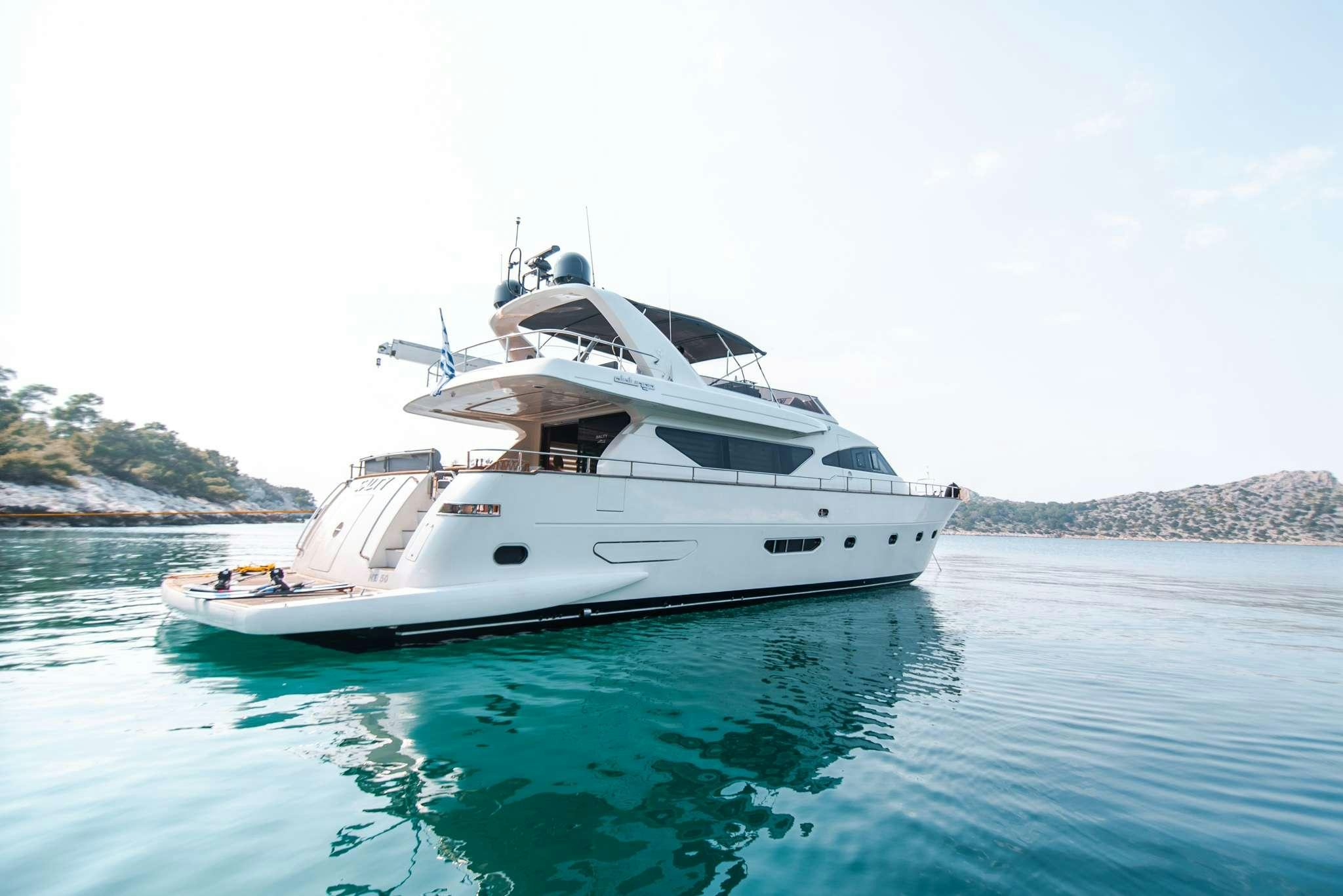 a white yacht in the water aboard SALTY Yacht for Charter