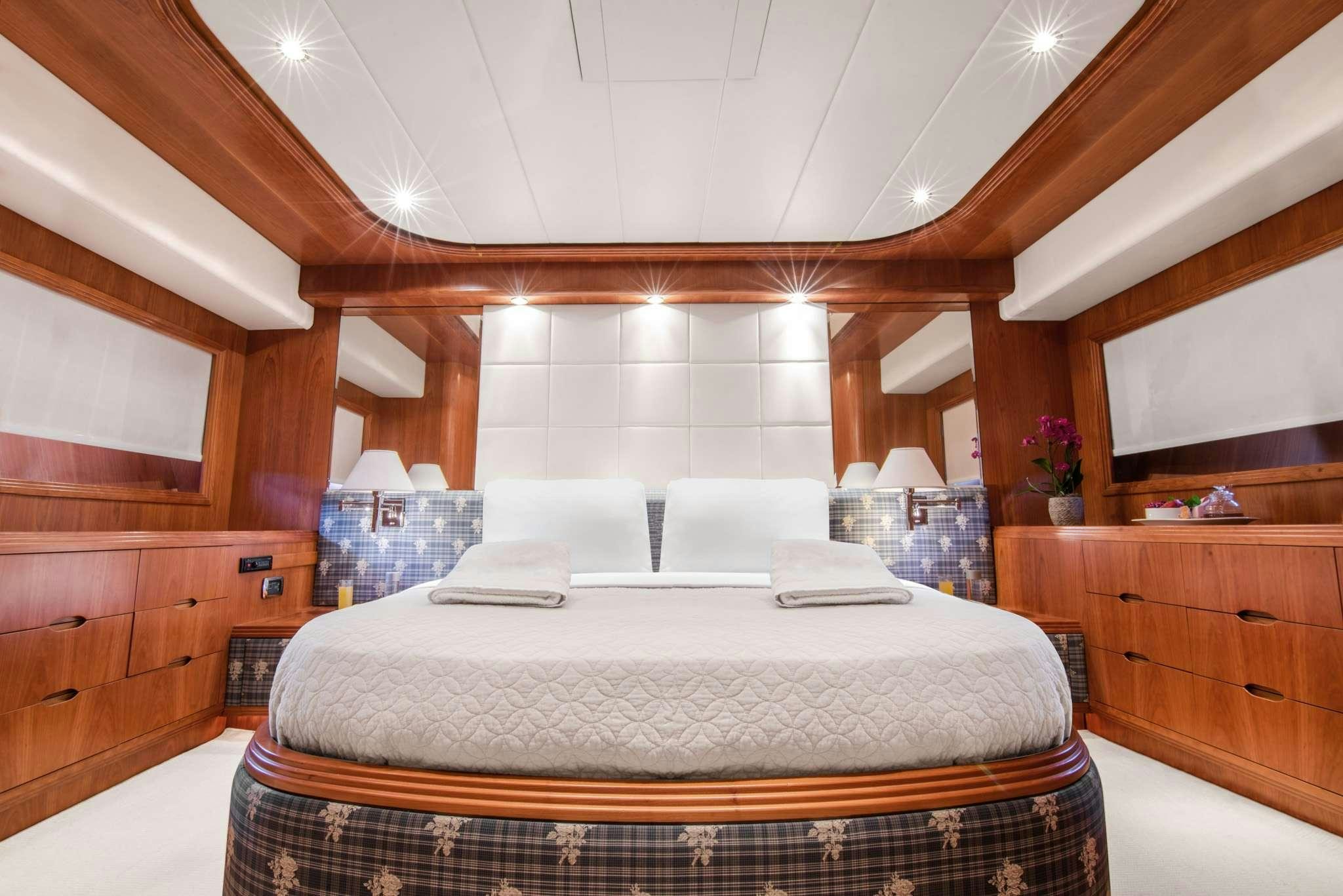 a large bed in a room aboard SALTY Yacht for Charter