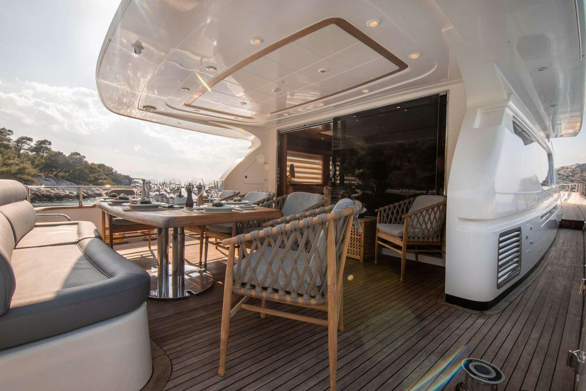 a room with a table and chairs aboard SALTY Yacht for Charter
