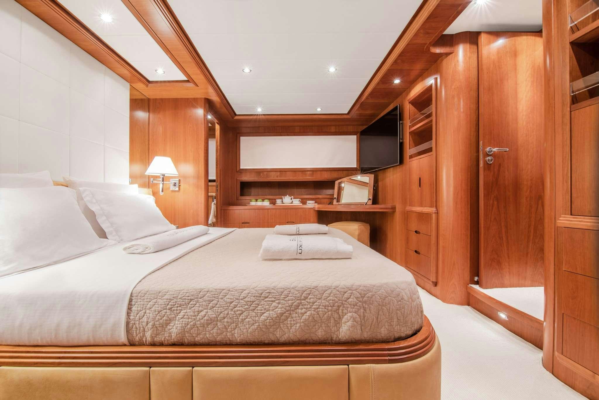 a bed in a room aboard SALTY Yacht for Charter