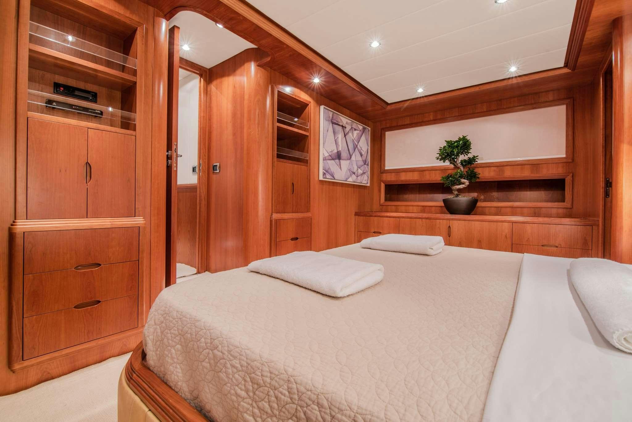 a bed in a room aboard SALTY Yacht for Charter