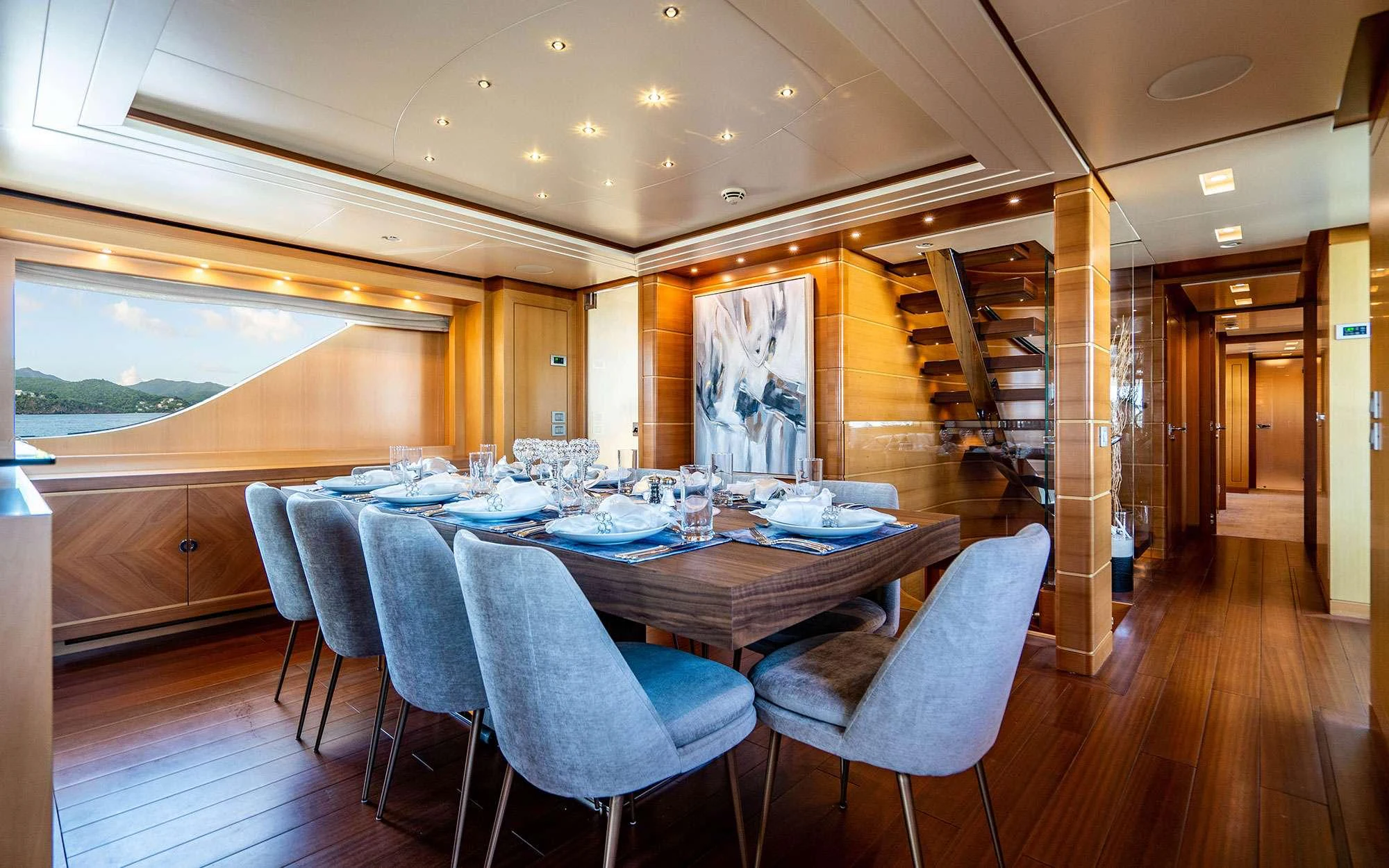 a dining room with a table and chairs aboard WHY NOT Yacht for Charter