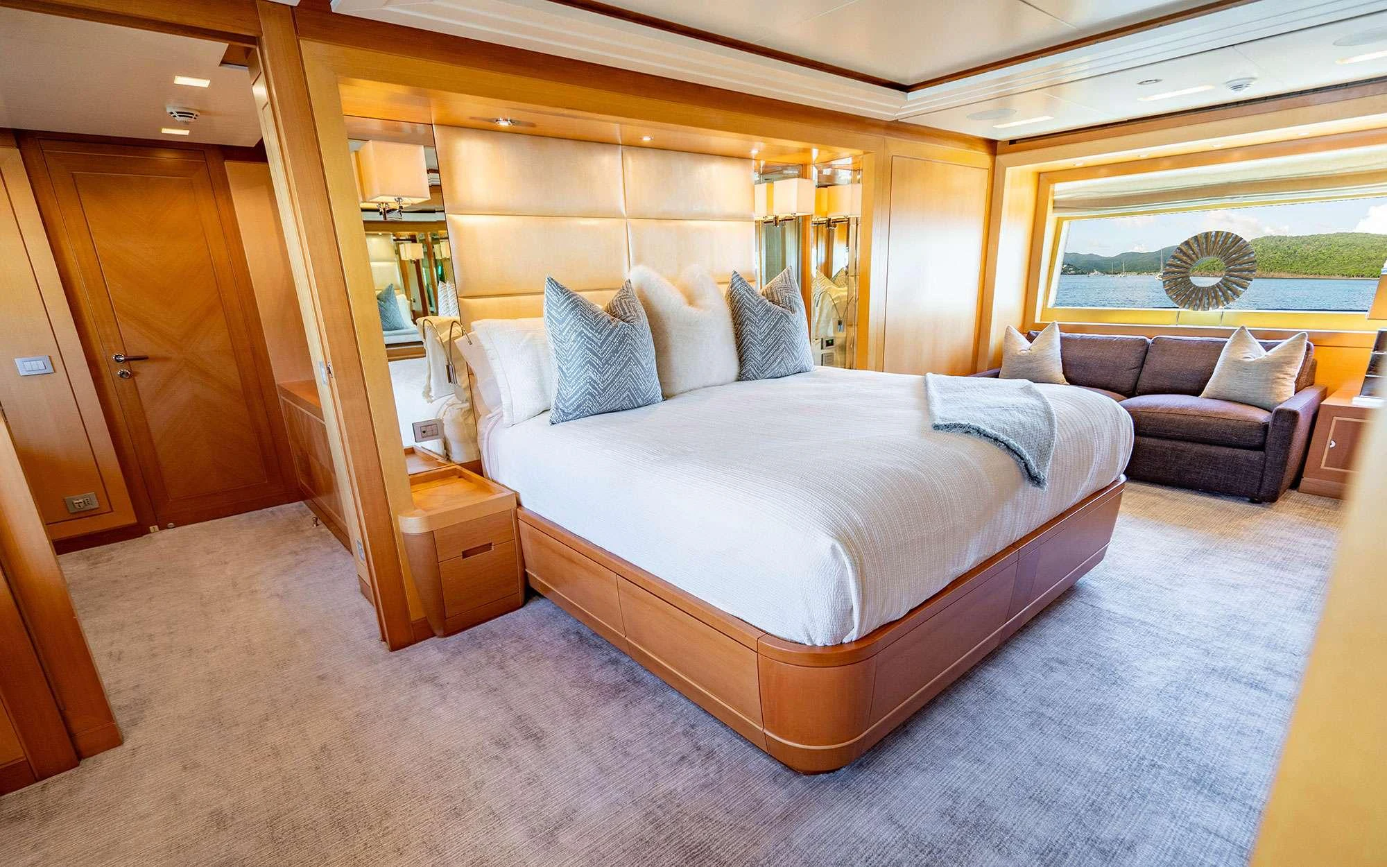 a bed in a room aboard WHY NOT Yacht for Charter