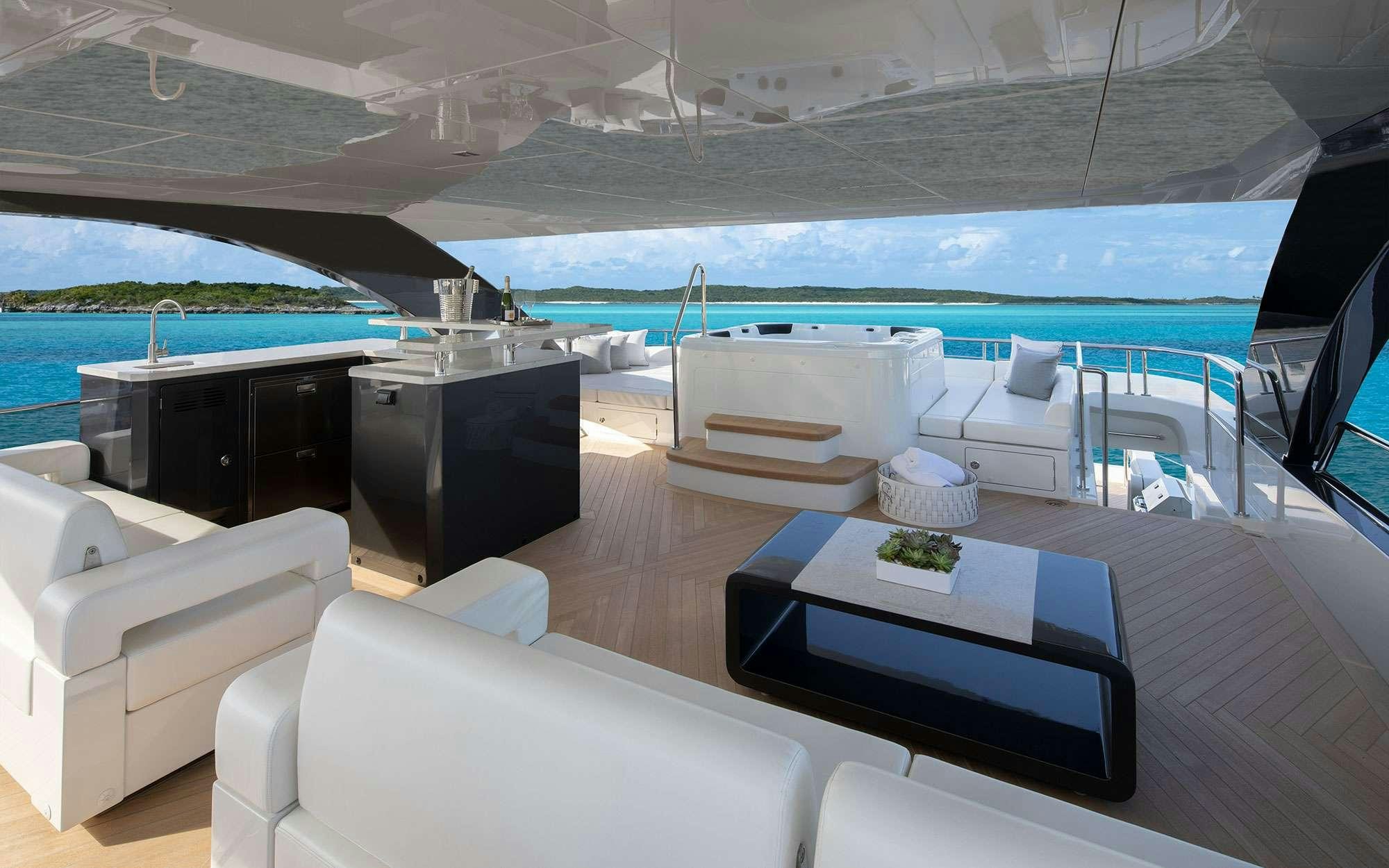 a modern living room with a pool aboard DREAMS Yacht for Charter
