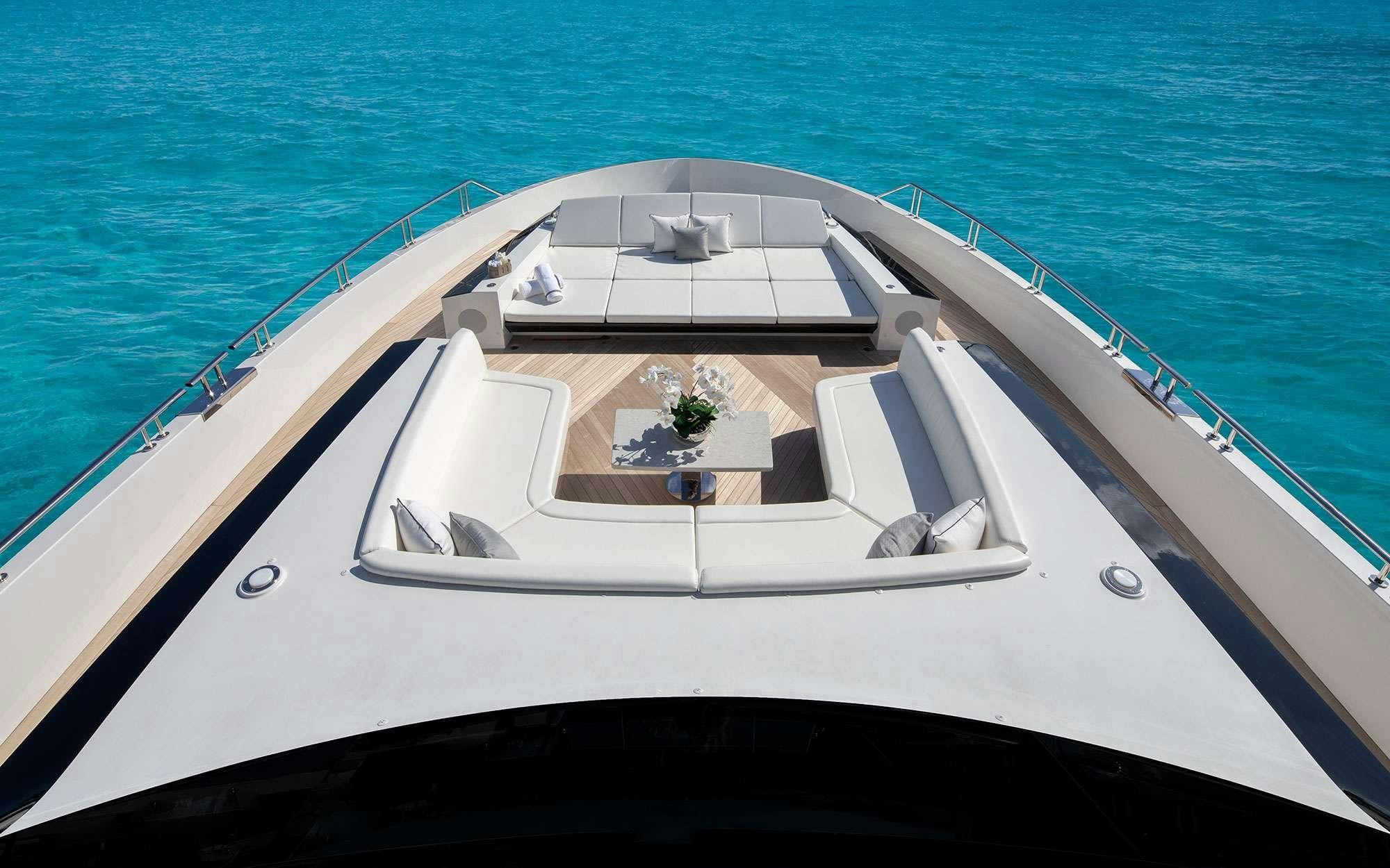 a white boat on the water aboard DREAMS Yacht for Charter