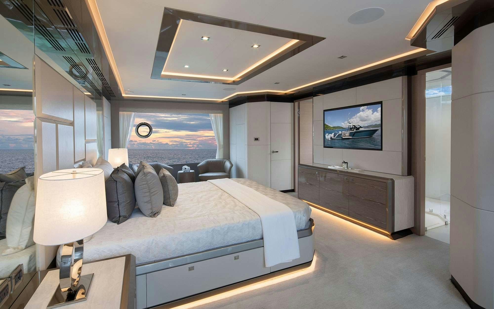 a bed in a room aboard DREAMS Yacht for Charter